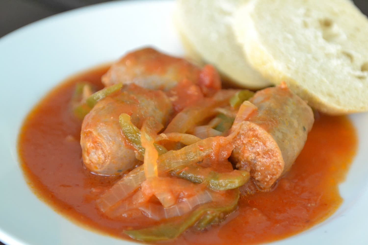 Serve these delicious sausage and peppers along side crusty bread to soak up that delicious sauce!