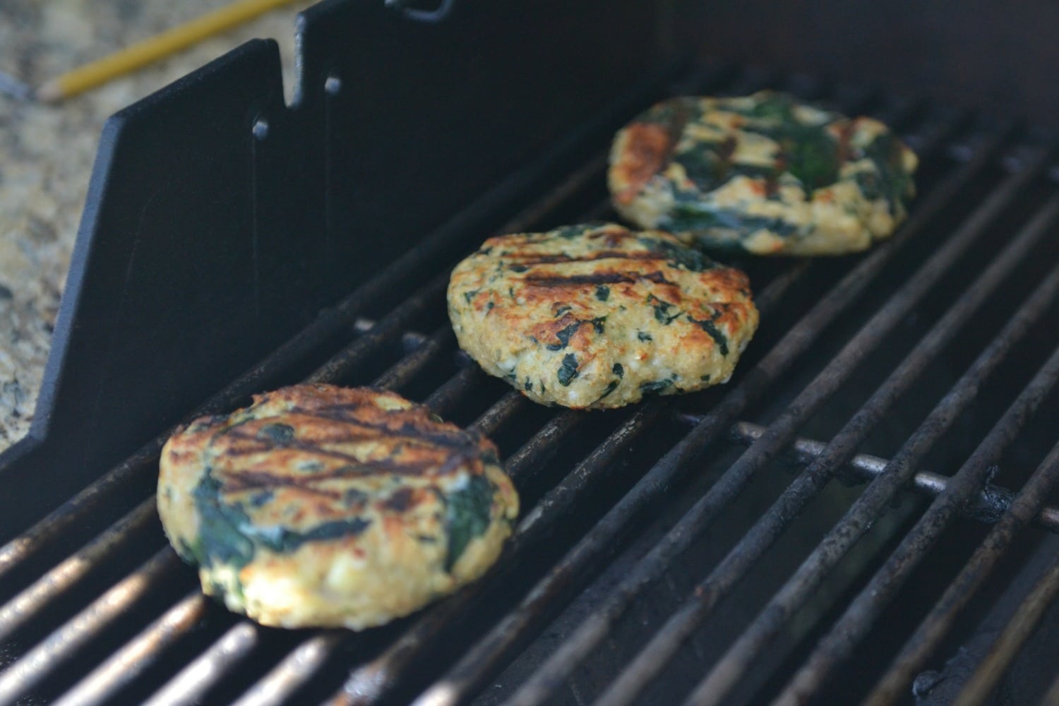 These moist and juicy turkey burgers cook up beautifully on the grill. 