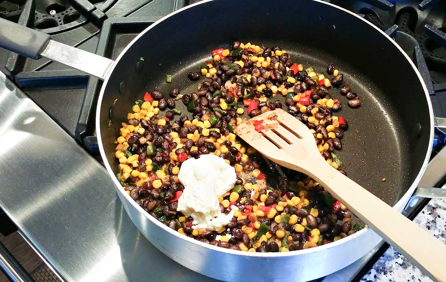 Add in mayo and lime juice to corn mixture and combine well.