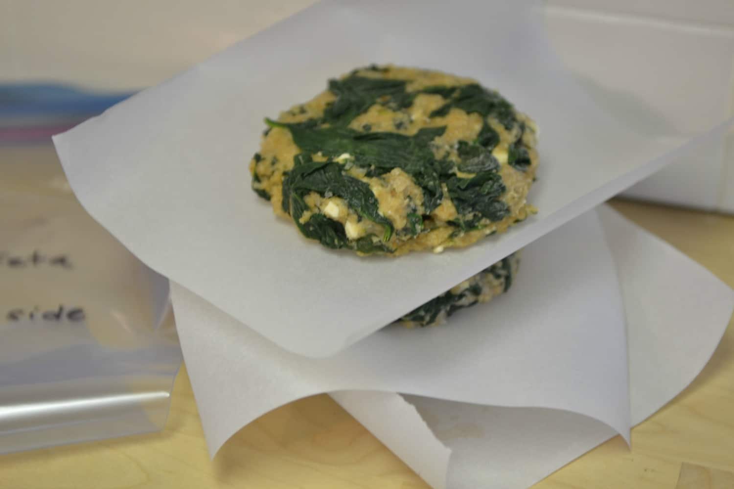 Flash freeze the burgers, then store them, using parchment to separate. 