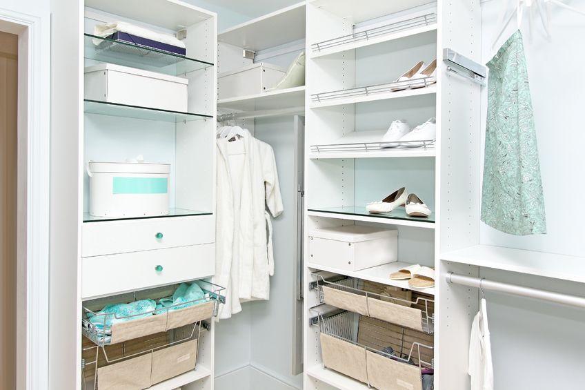 An organized closet or storage space can help you feel less cluttered!