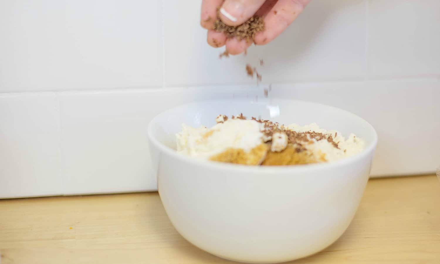 Add chocolate shavings to the top of the ice cream and serve. 