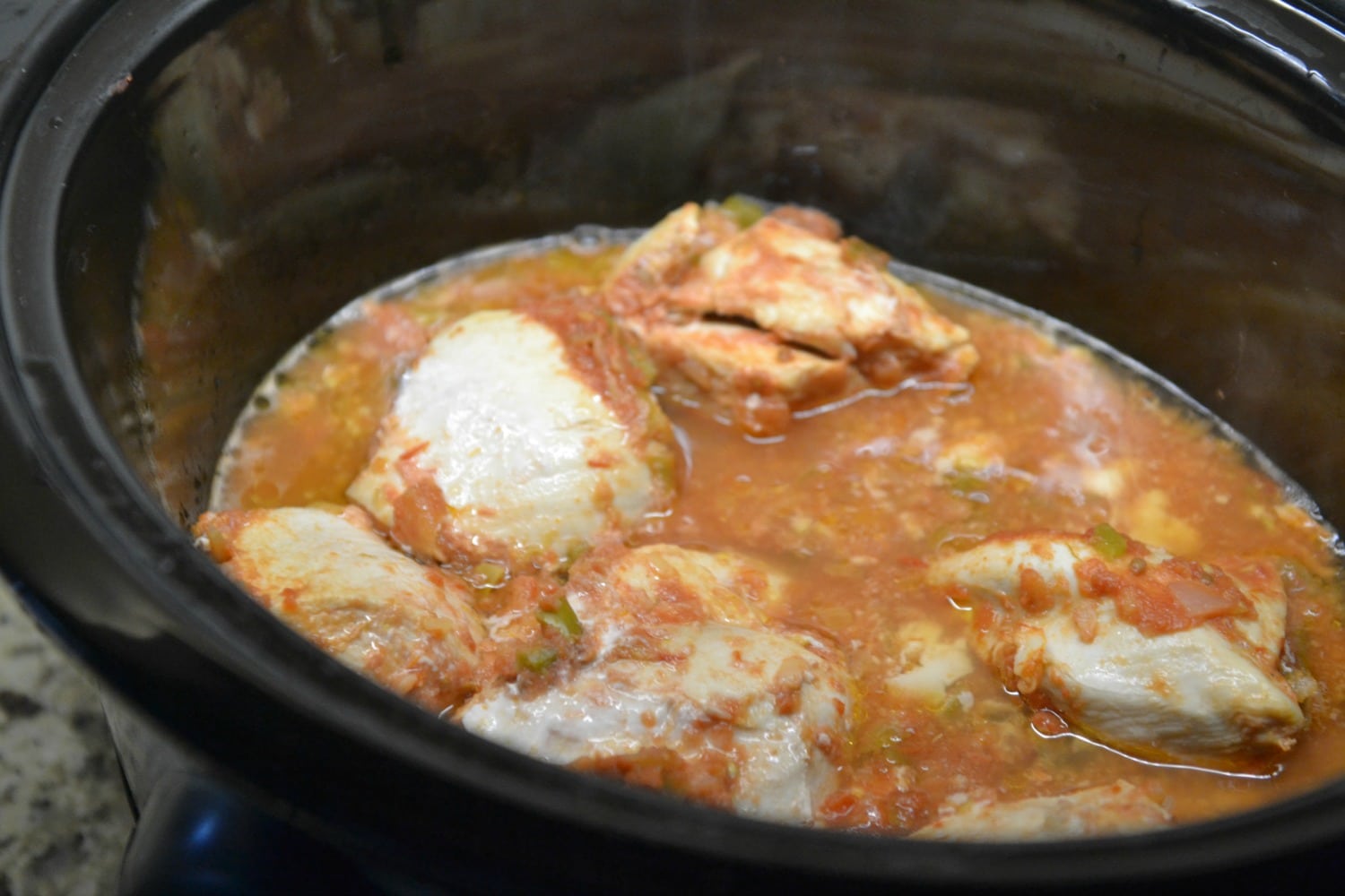 Place chicken and salsa mixture directly into slow cooker. 