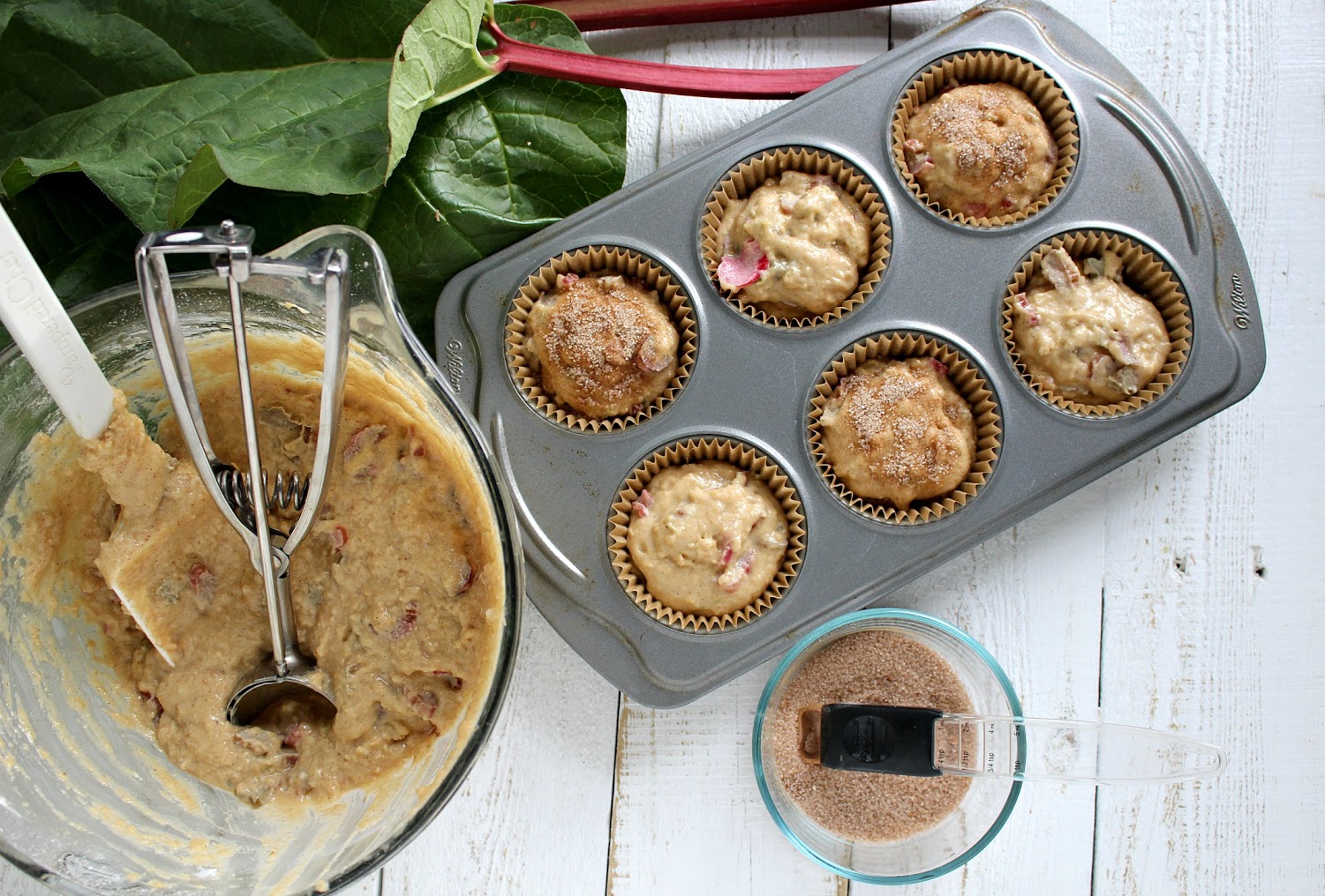 Mix cinnamon and sugar in a small cup and sprinkle over the batter before baking. 