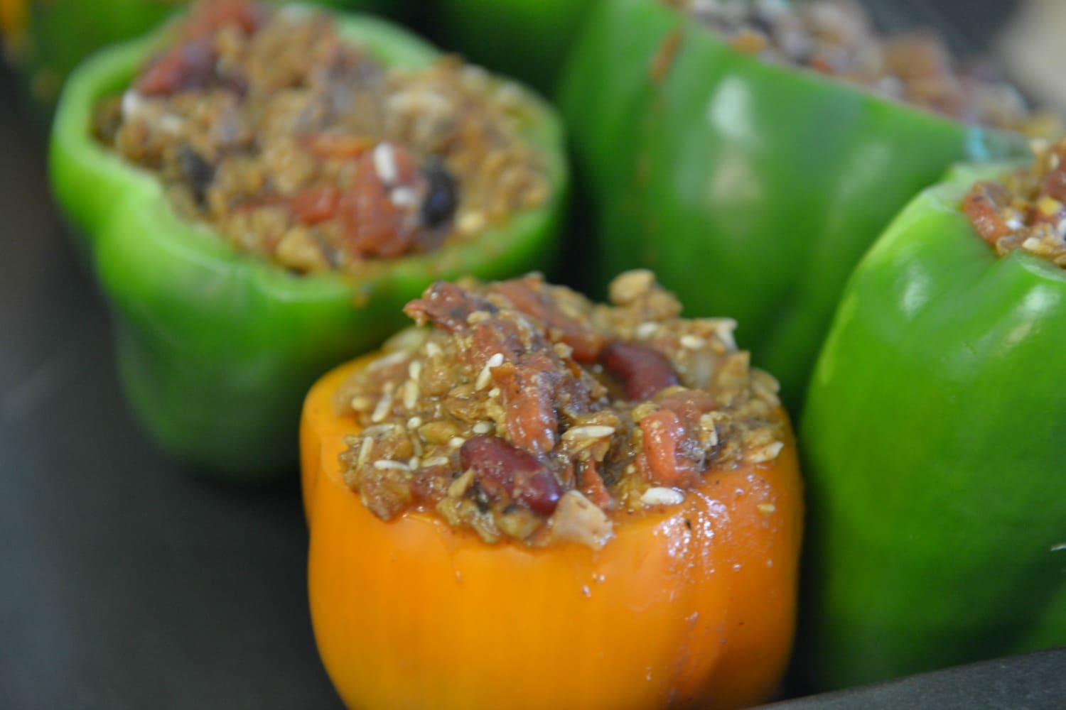 Spoon mixture into cored peppers. 