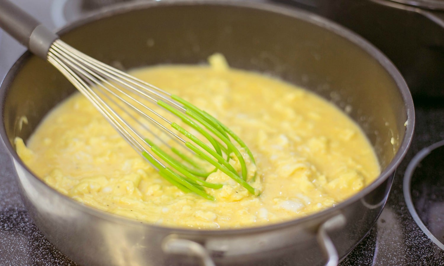 Scramble the eggs over medium heat