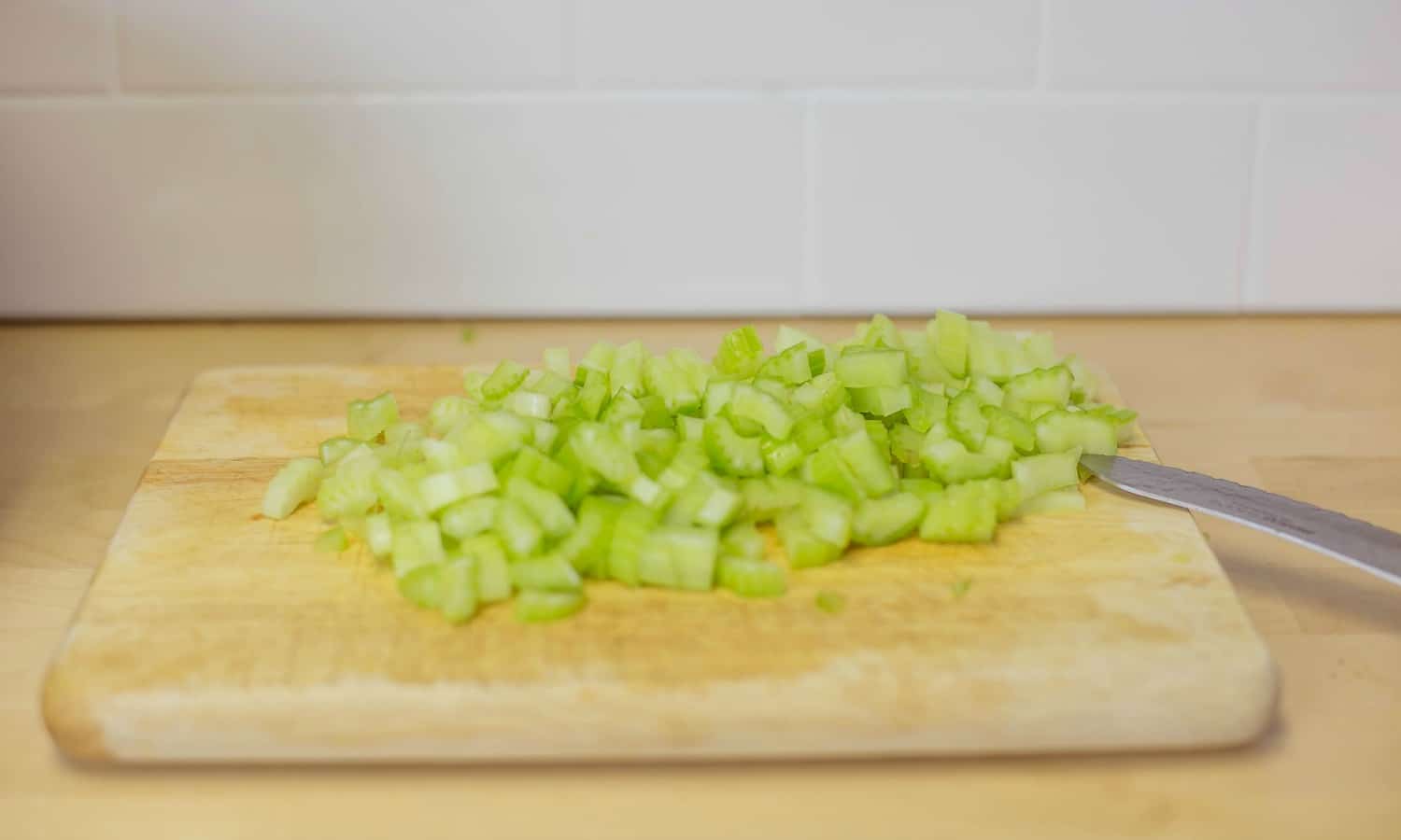 Chop the celery for your jambalaya.