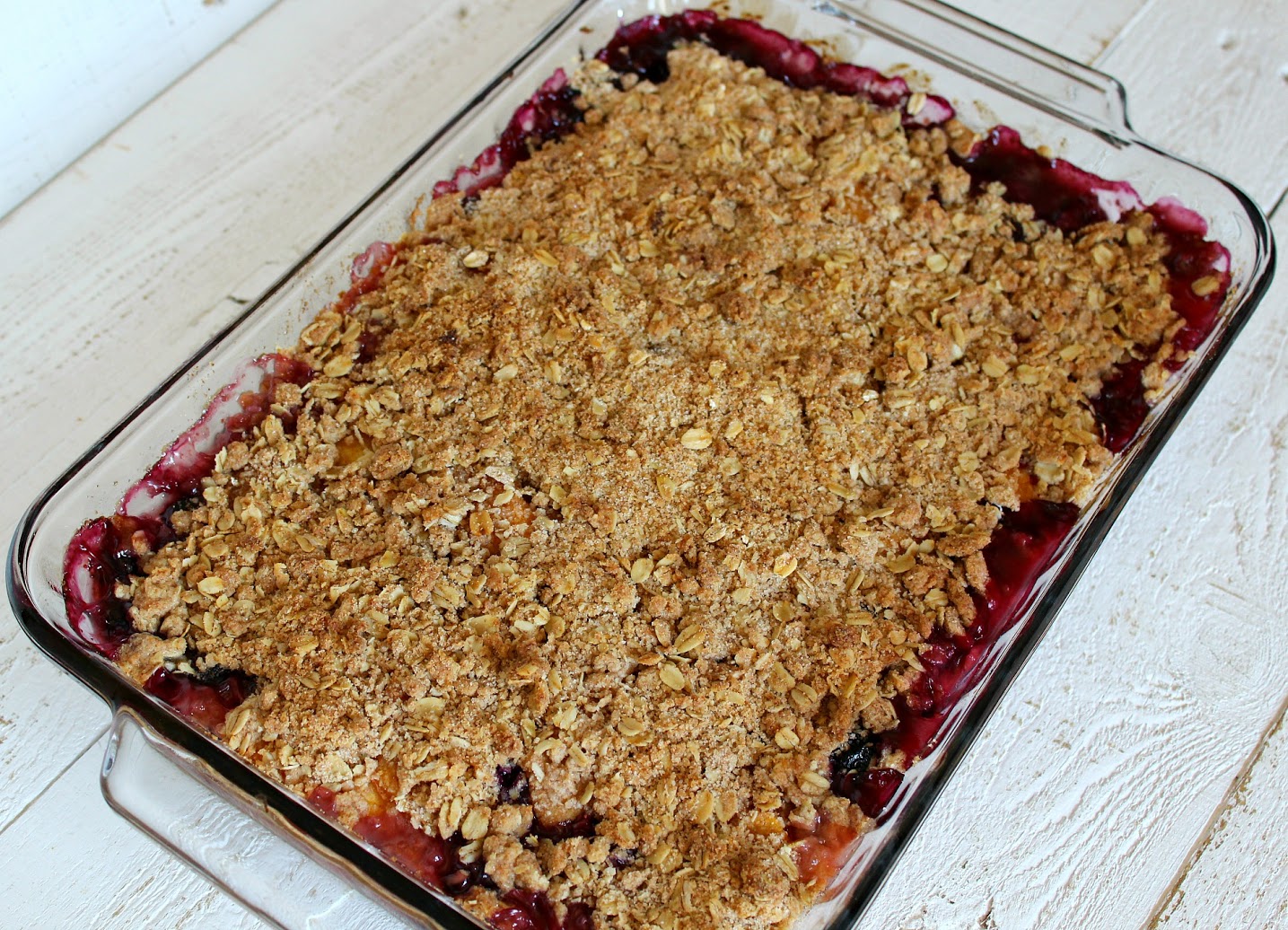 Bake the blueberry peach crumble until the top is browned and the fruit is bubbling. 