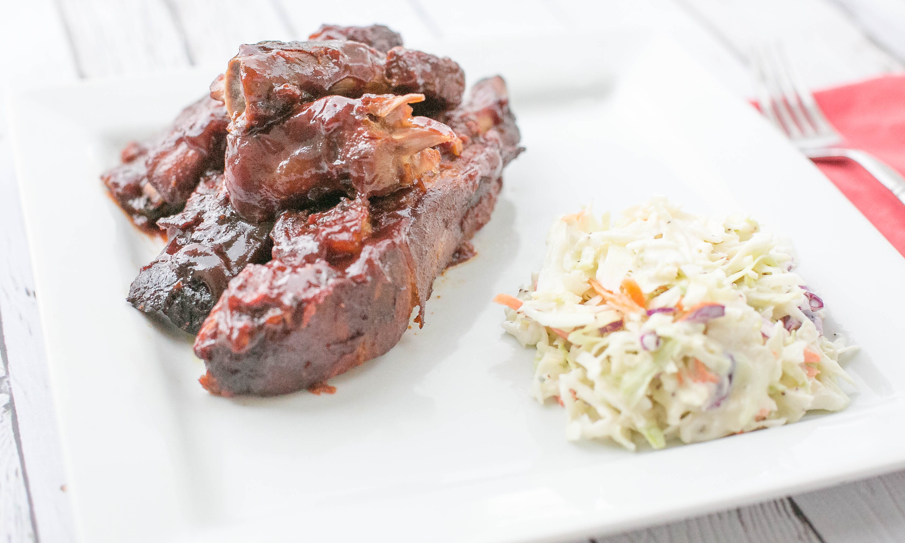 These sweet and spicy BBQ ribs are a delicious dinner. Serve with sides like coleslaw or cornbread for a hearty meal
