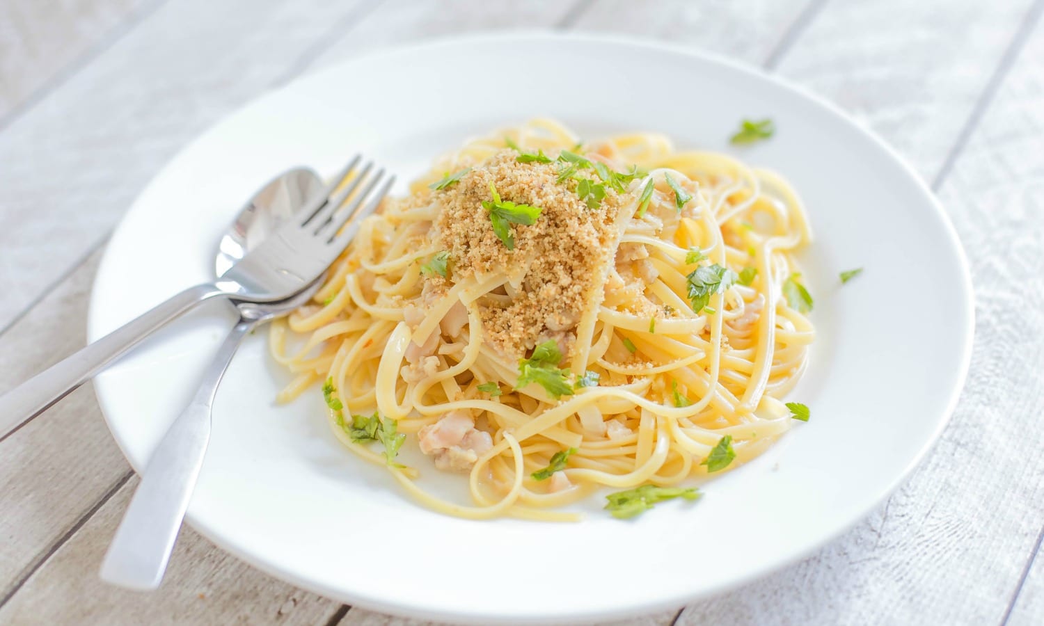 Serve the One Pot Pasta and Clam Sauce in bowls, top with crunchy bread crumbs and fresh parsley, enjoy!