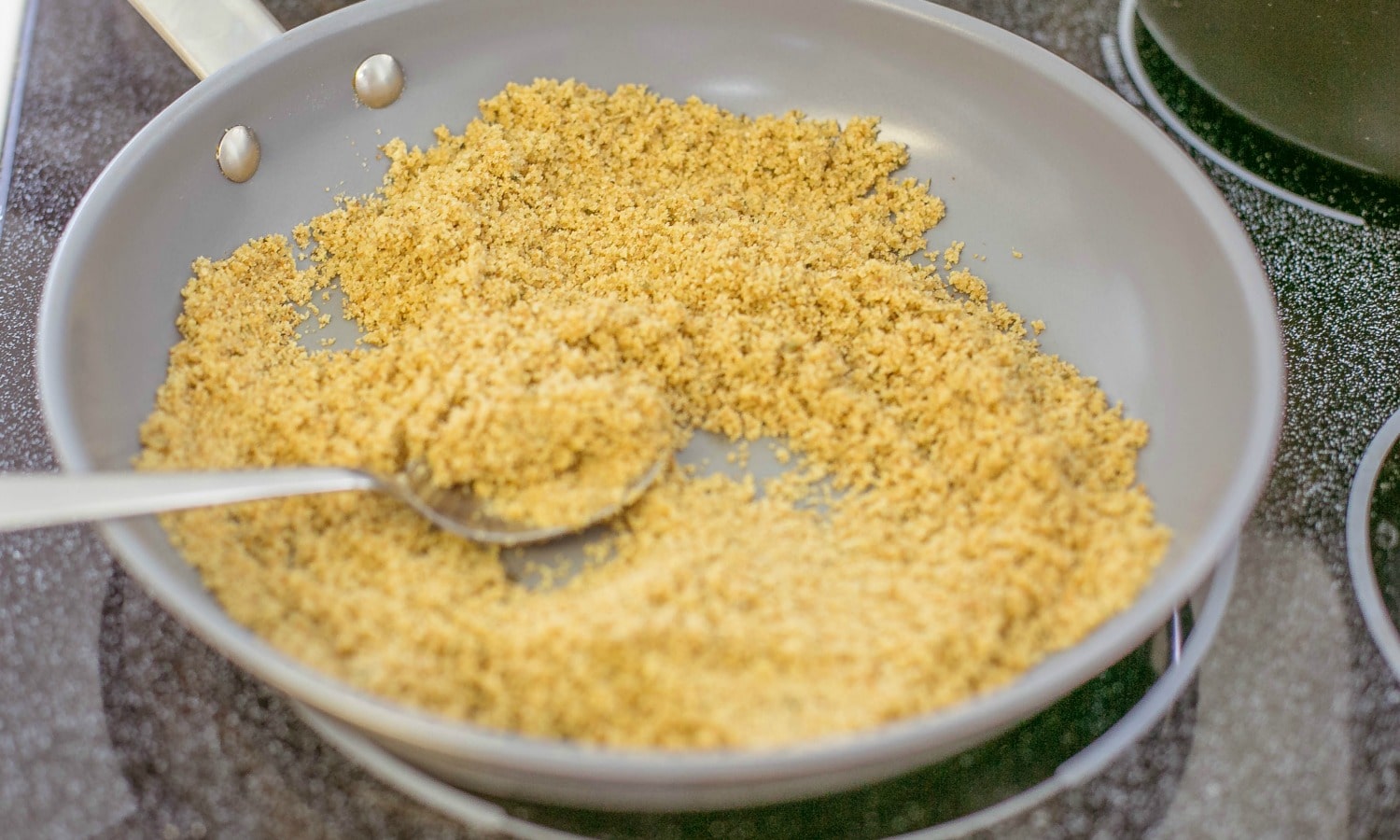 The first step for One Pot Pasta and Clam Sauce is to brown the bread crumbs.