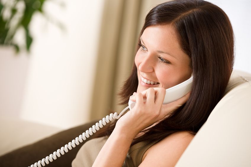 A woman talking on the phone. 