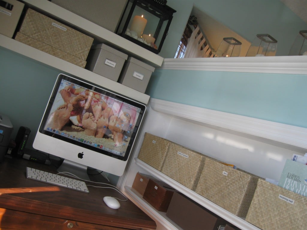 This home office has labeled boxes and an organized spot for everything. 