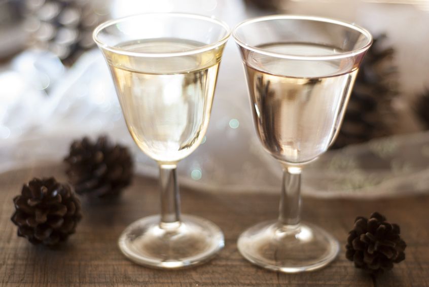 Limit the beverage options to wine at a holiday party to save money. 