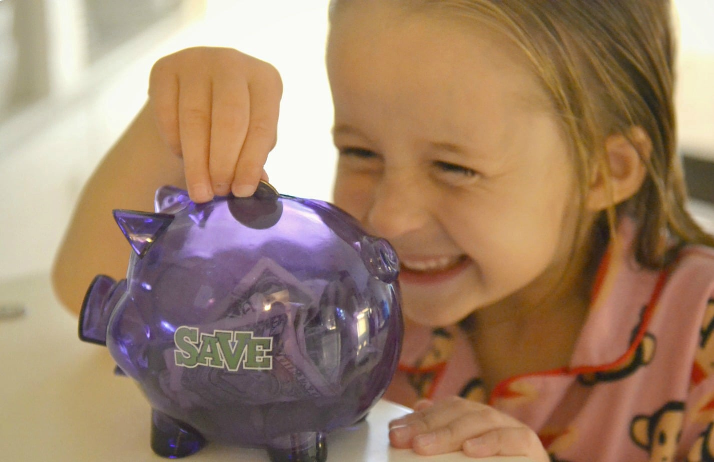 Teach kids how to get excited about saving money!