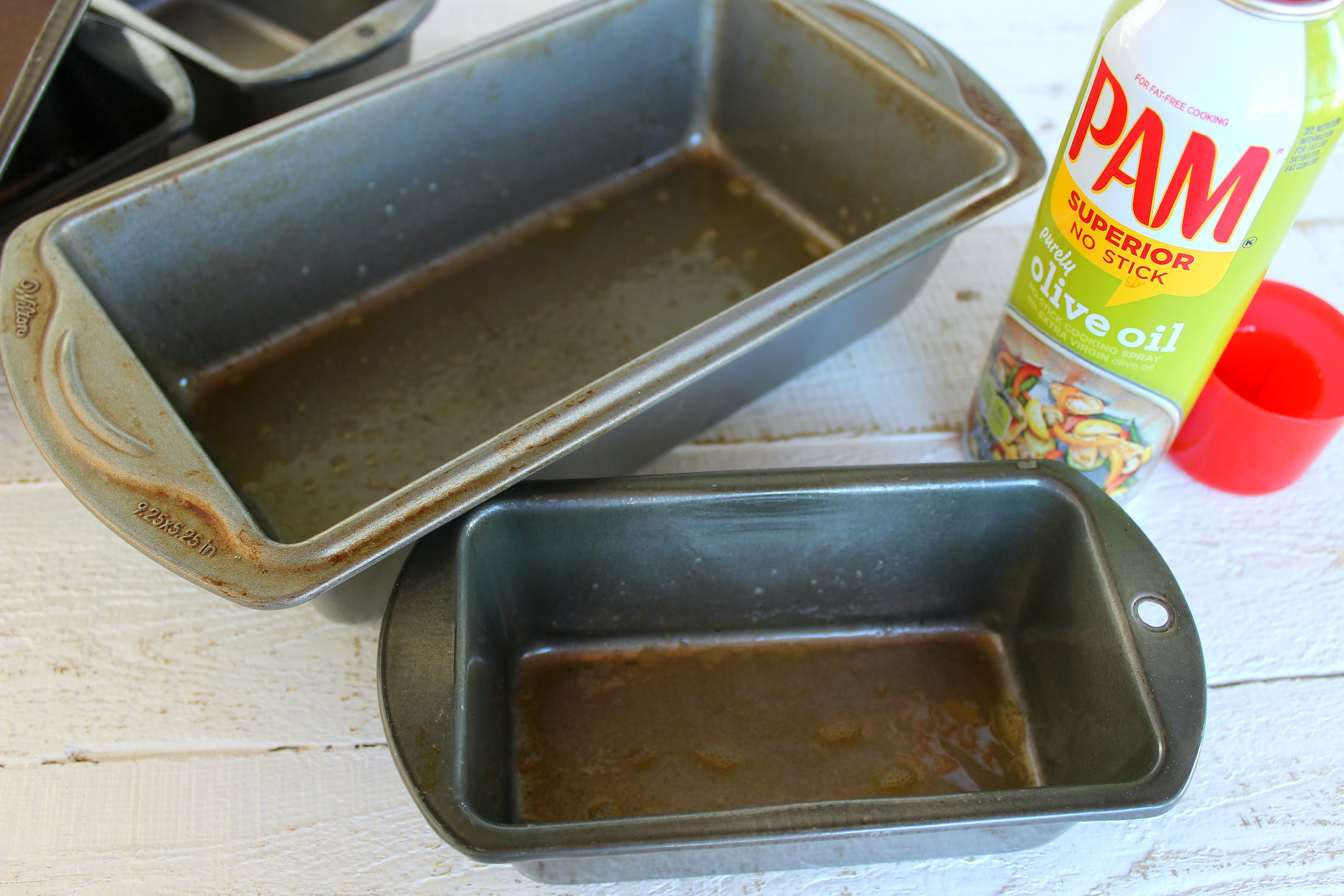 Use some nonstick spray to coat your loaf pans for your pumpkin bread. 