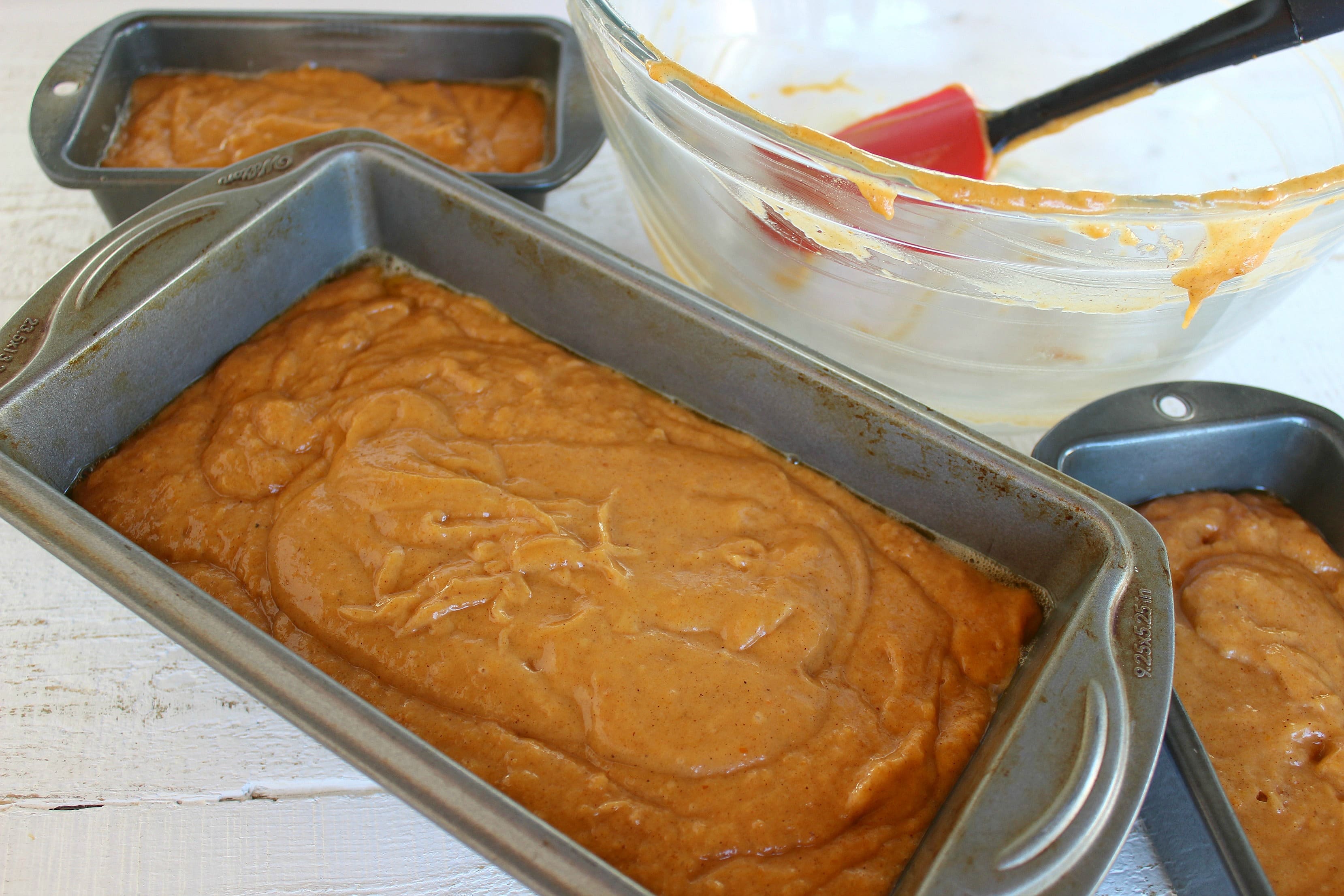 Pour the pumpkin batter into your loaf pans.