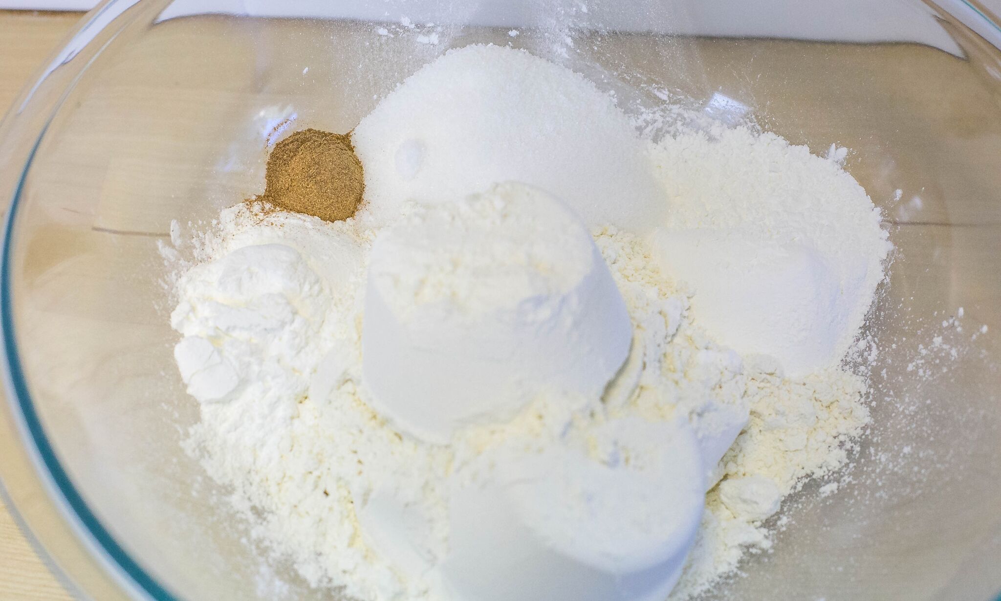  In a large bowl mix together flour, cornstarch, sugar, pumpkin pie spice and baking powder.
