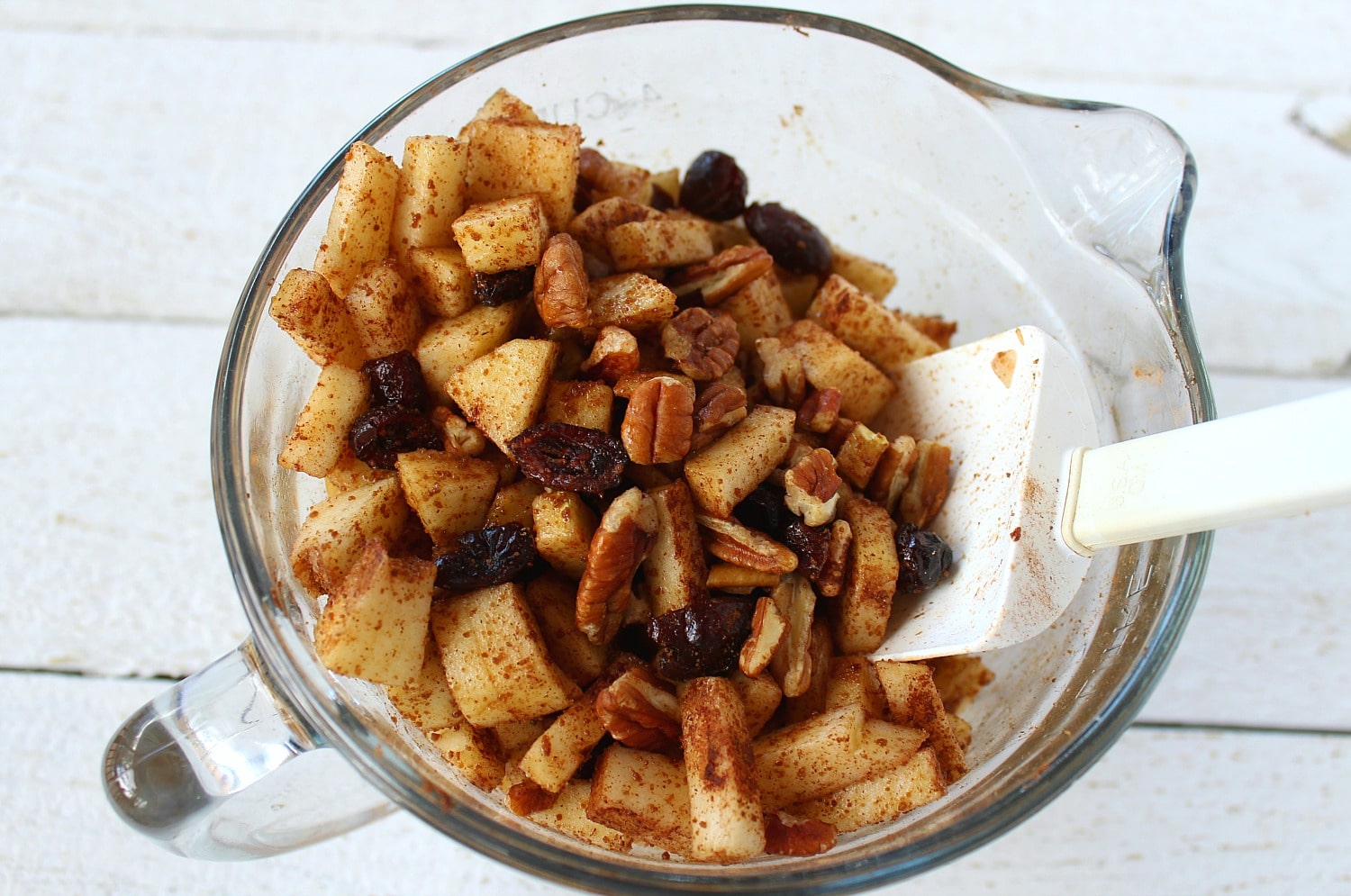 Combine diced apples, chopped pecans, dried cranberries, coconut sugar, salt and cinnamon in a medium sized bowl.