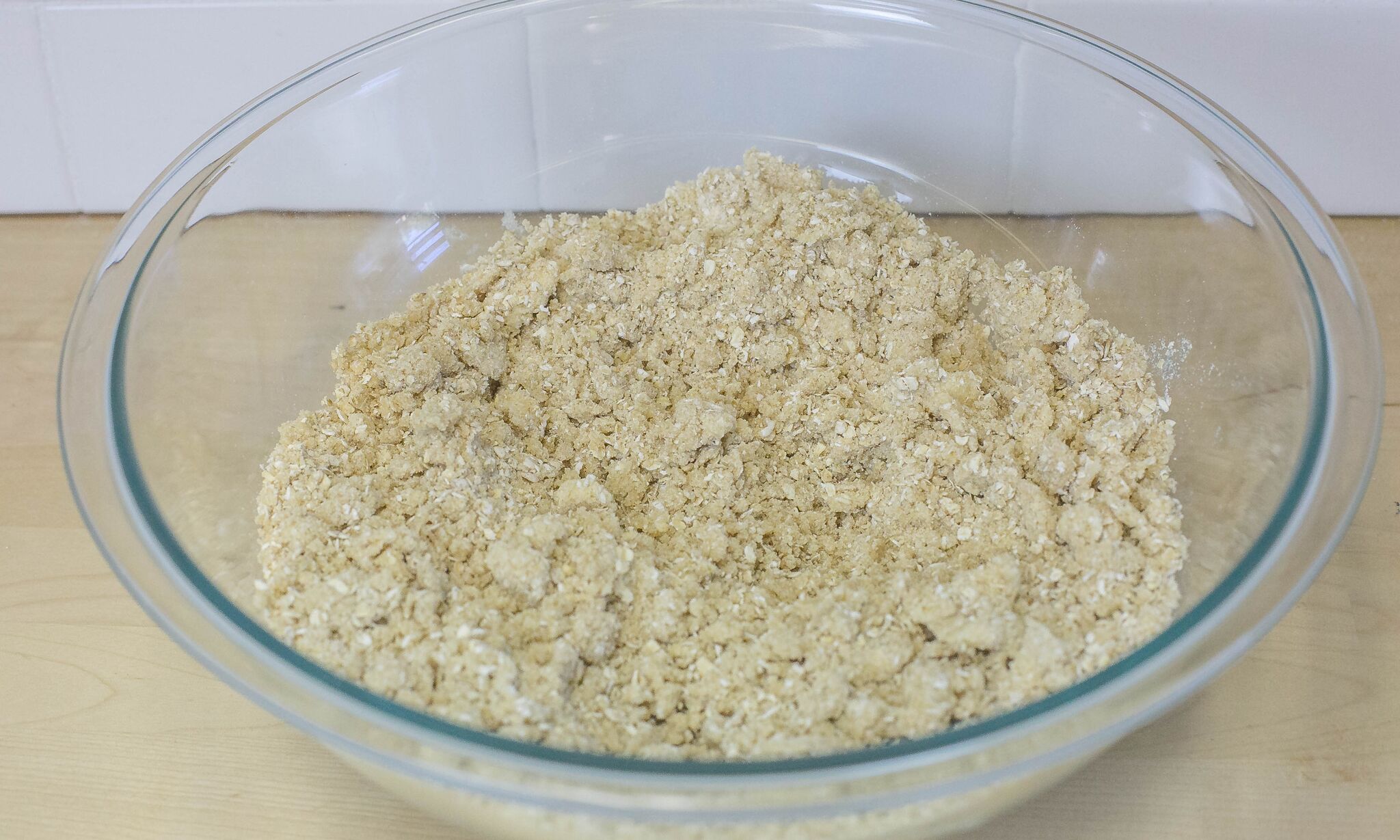 In a large bowl combine cookie mixture softened butter until crumbly.