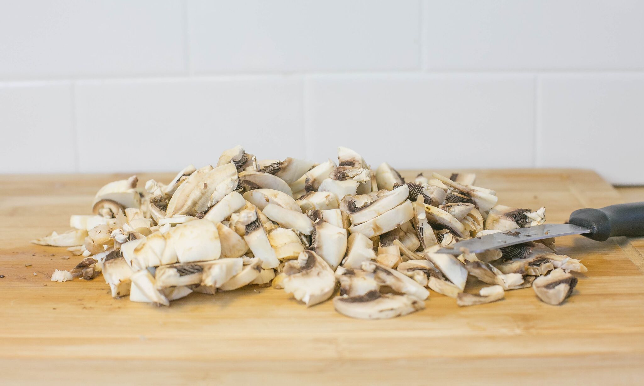 Clean and chop mushrooms and set aside.