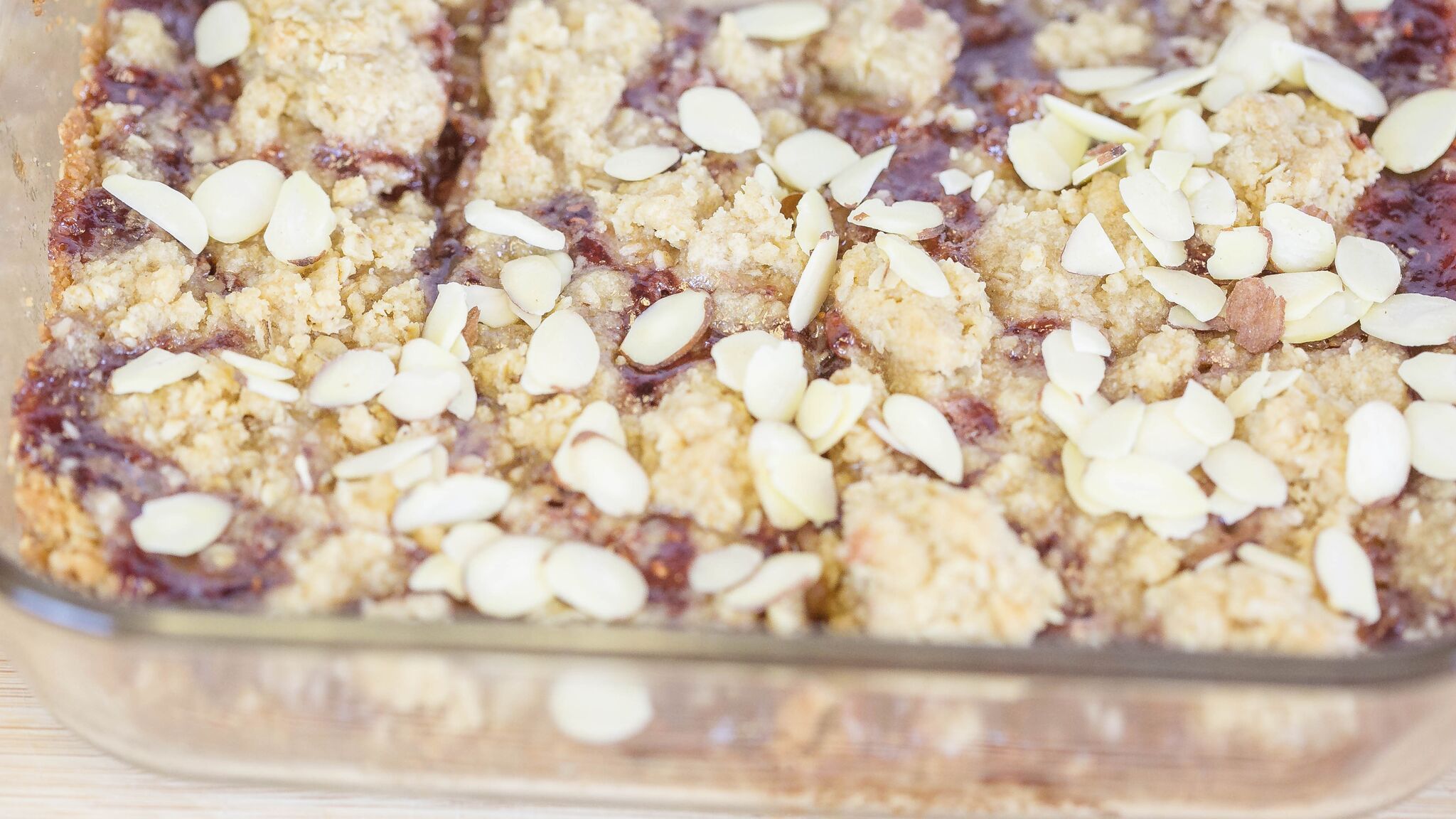 Bake until mixture is bubbly and top with almonds. 