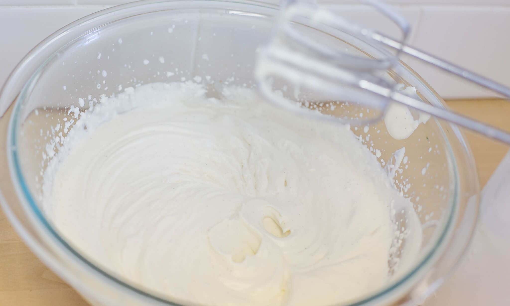 Beat cream on high speed until it begins to thicken.