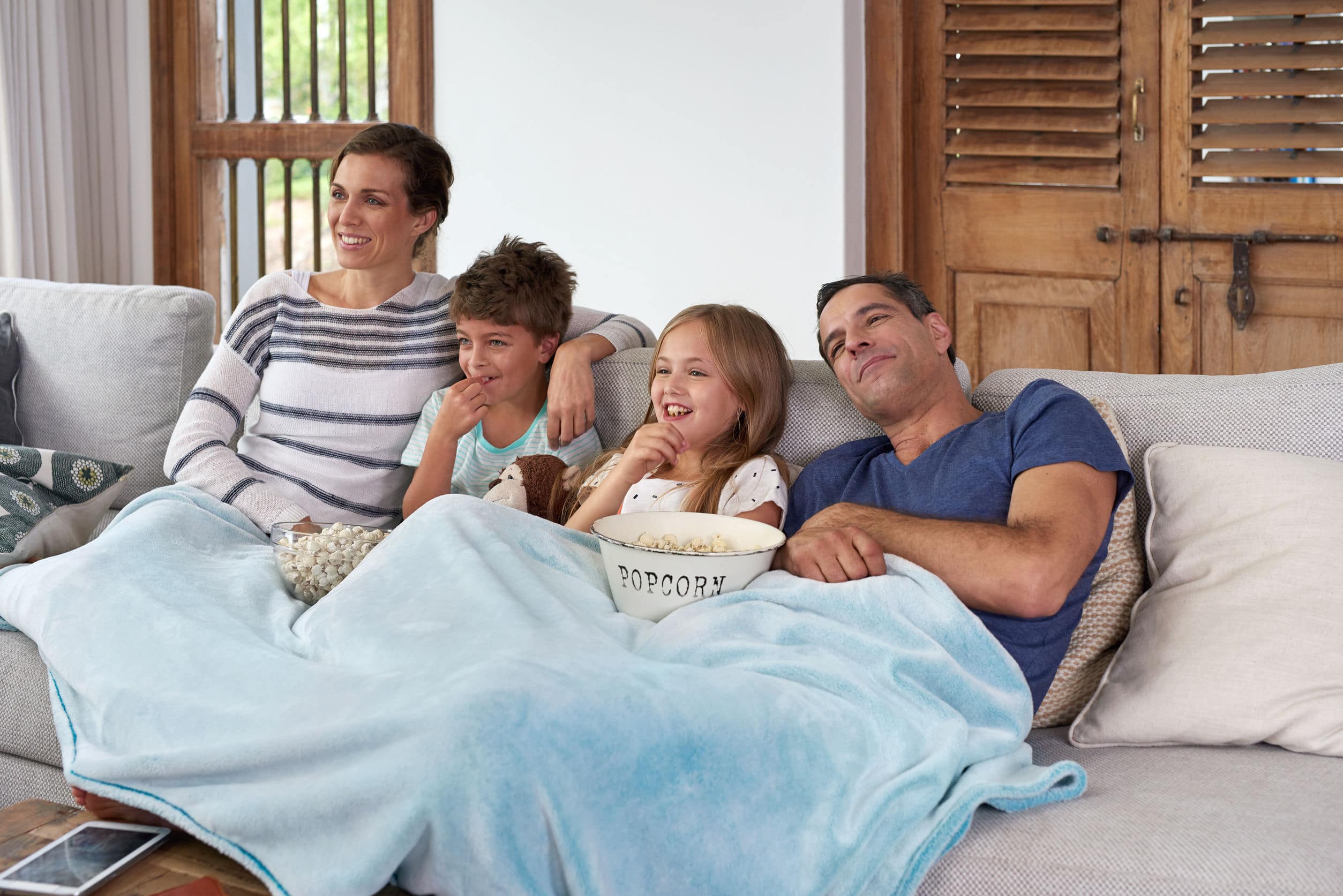 An at-home family movie night is a budget-friendly christmas break idea