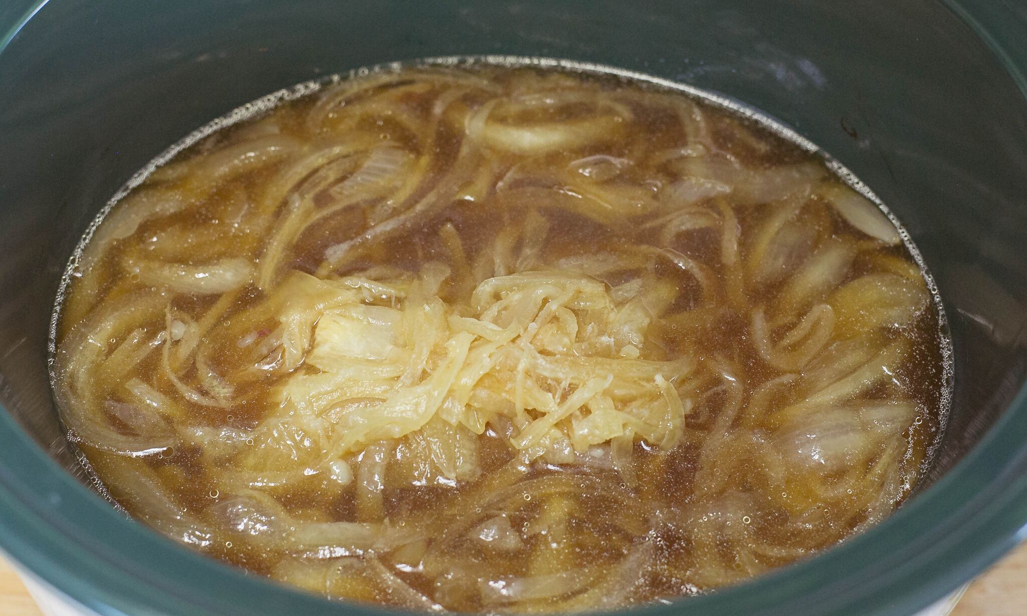 Cook frozen french onion soup in slow cooker