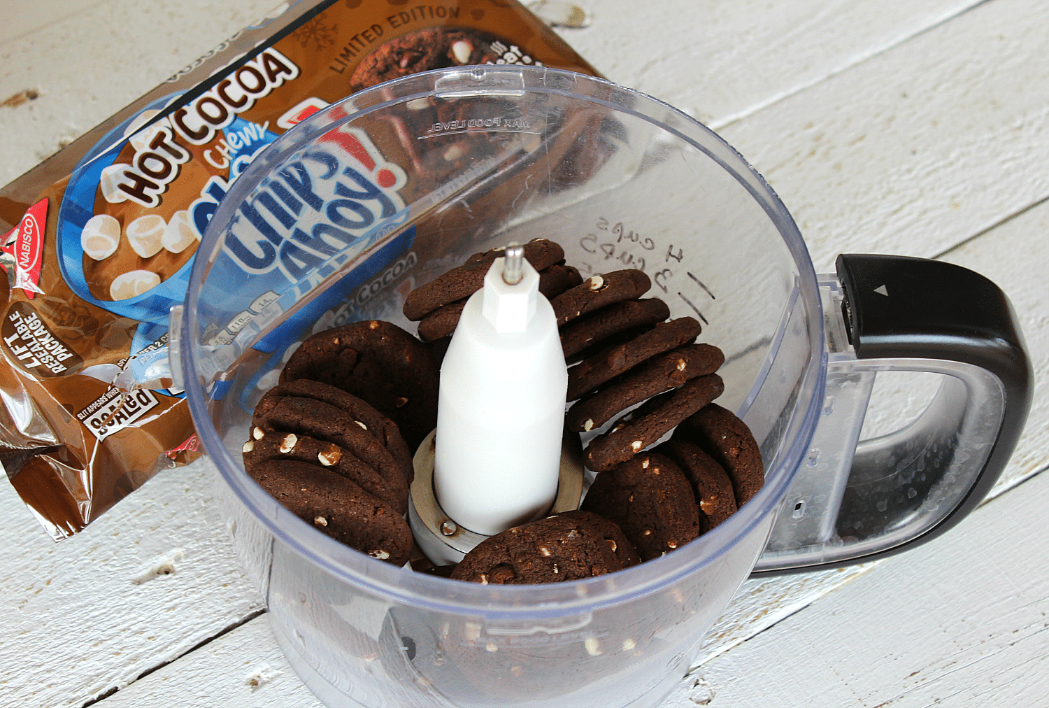 Place the entire package of hot cocoa cookies in food processor.