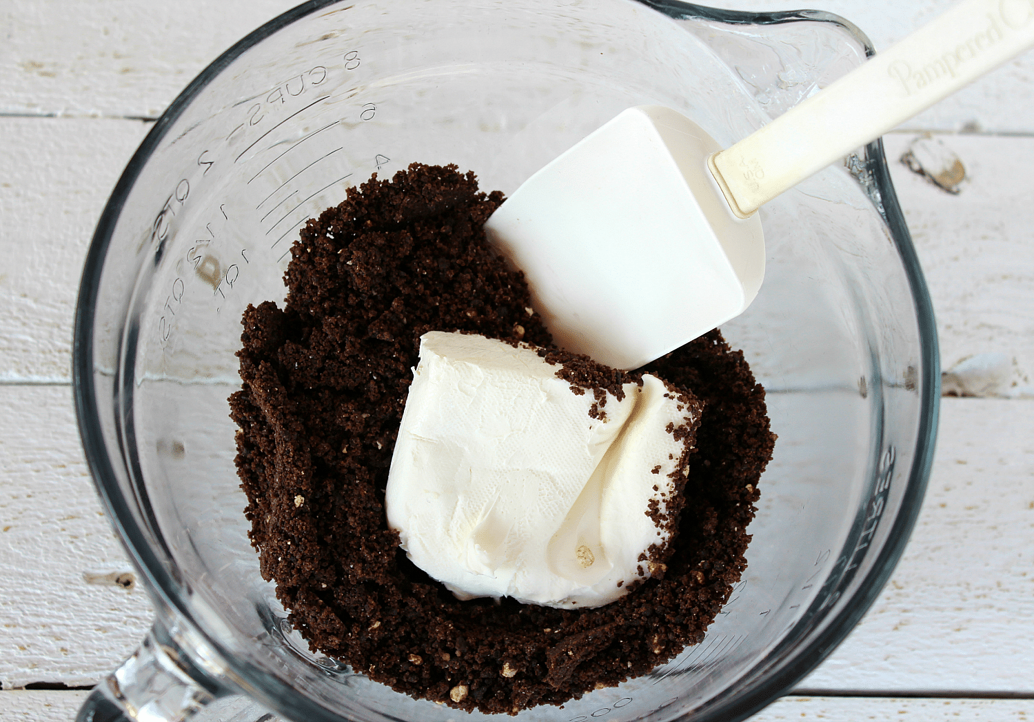 our cookie mixture into a large bowl with 4 oz of room temperature cream cheese.