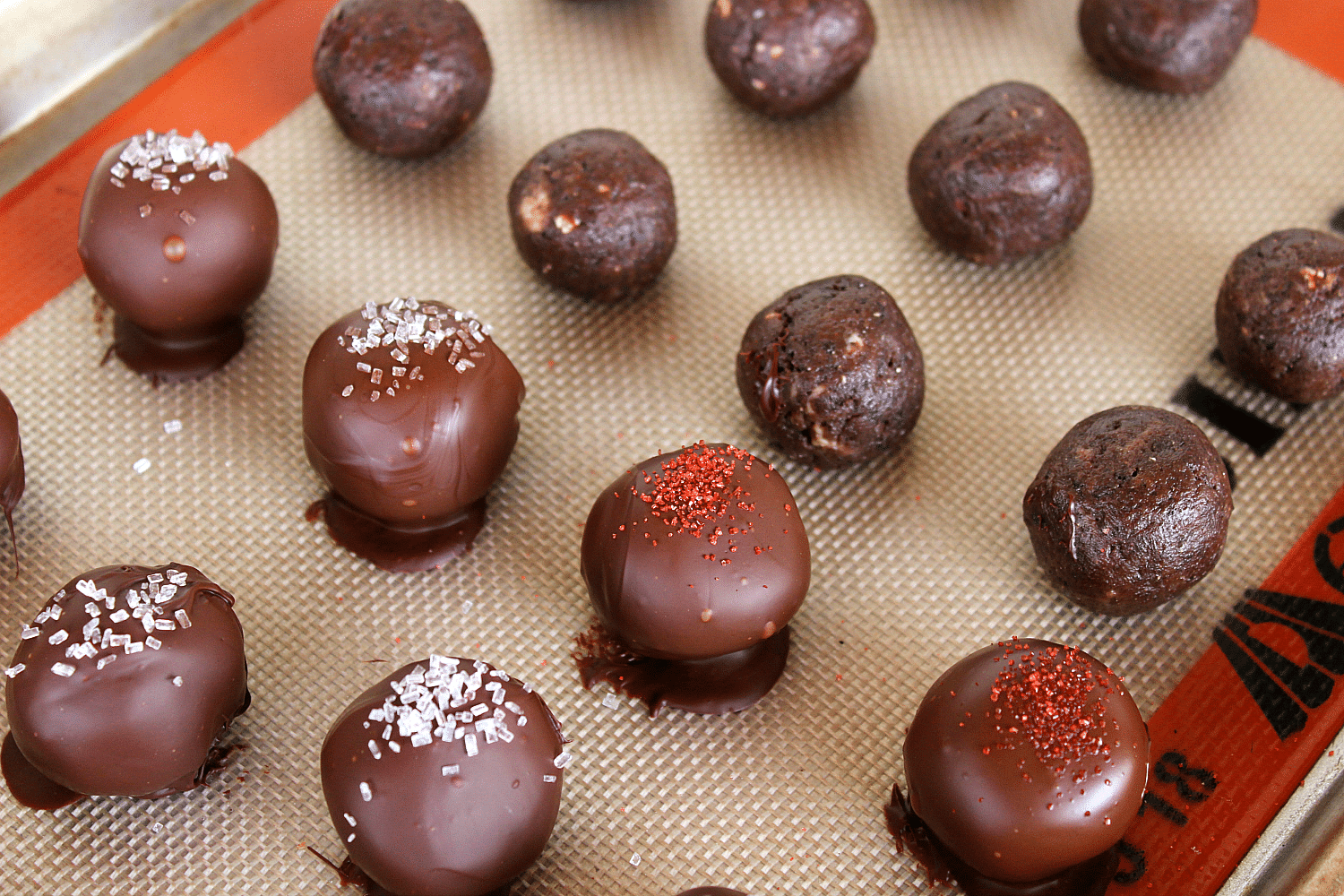 Place finished truffles on the lined cookie sheet and sprinkle immediately with sprinkles or cookie crumbs before they cool.