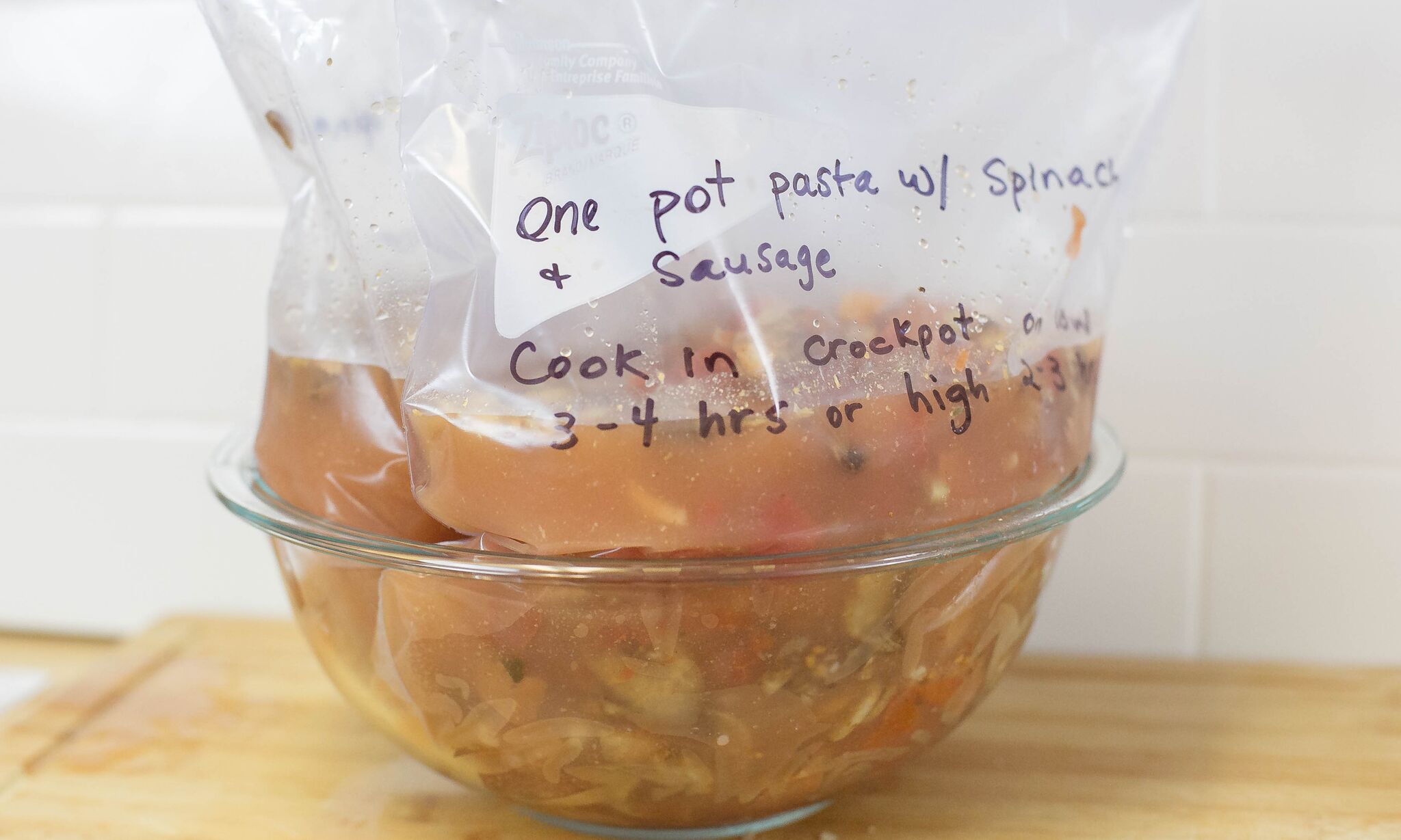 Divide mixture into 2 gallon size freezer bags labeled with cooking instructions. 