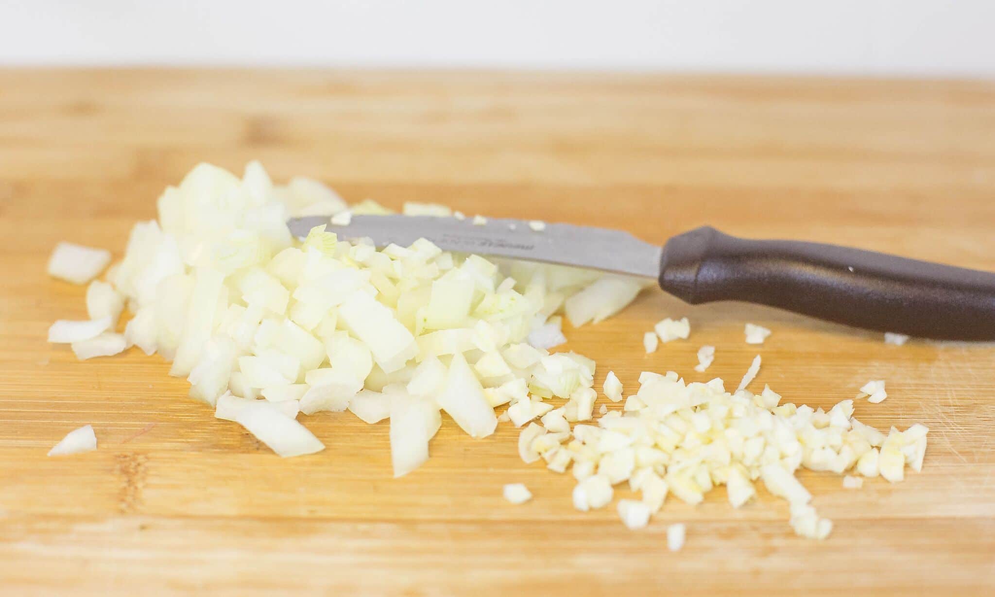 Dice onion and mince garlic and set aside.