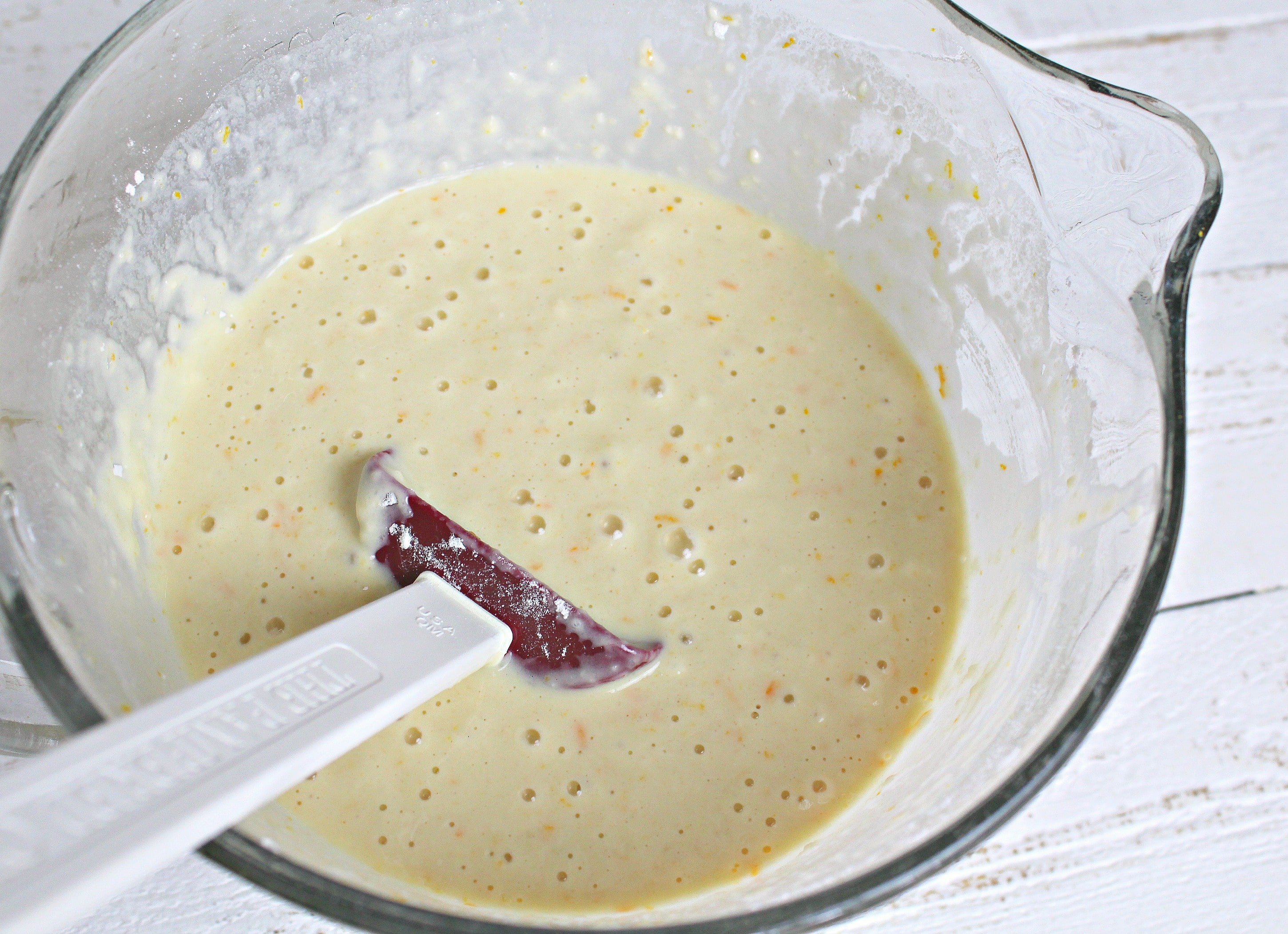 Pour the wet ingredients into the dry ingredients and stir until just combined.