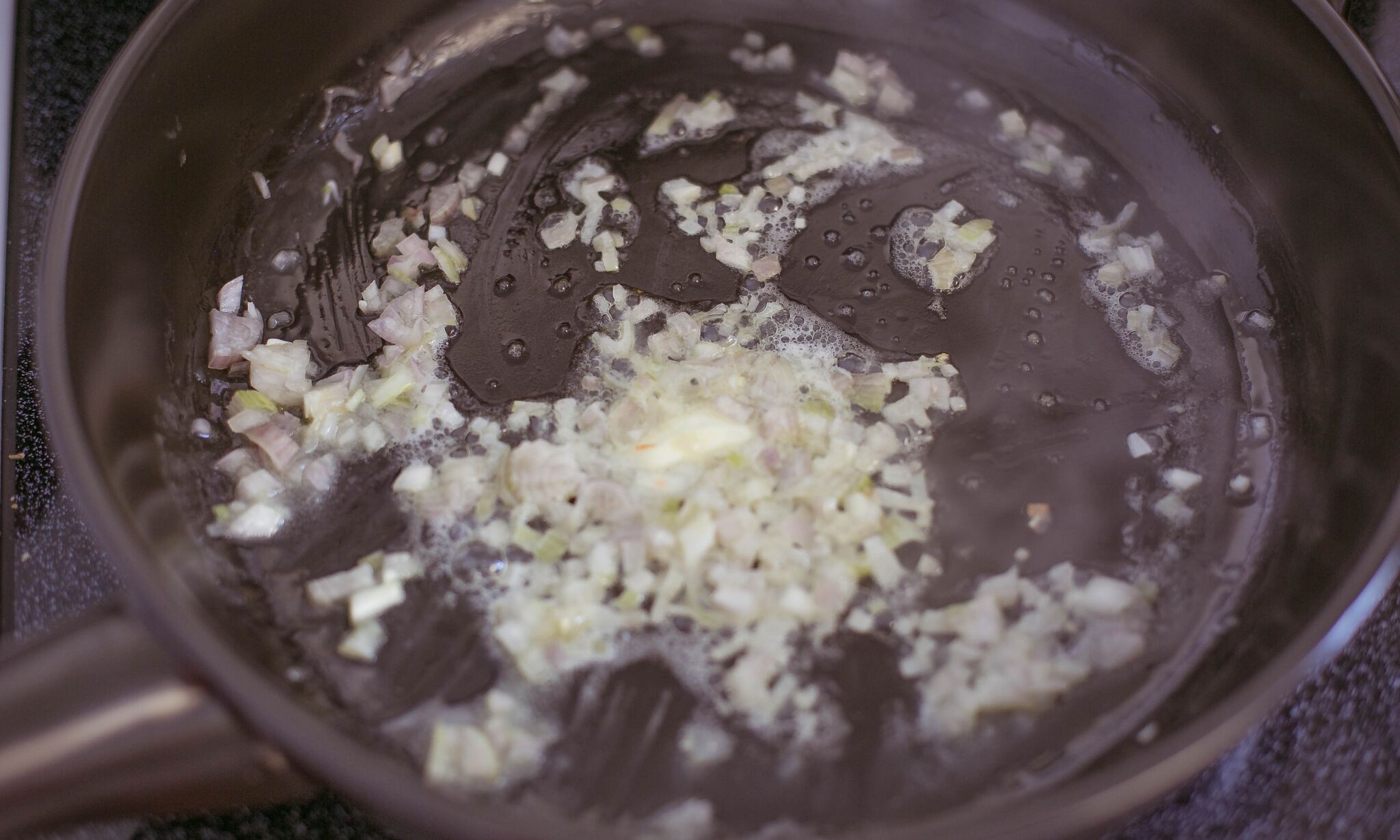 Saute chopped shallots in butter. 