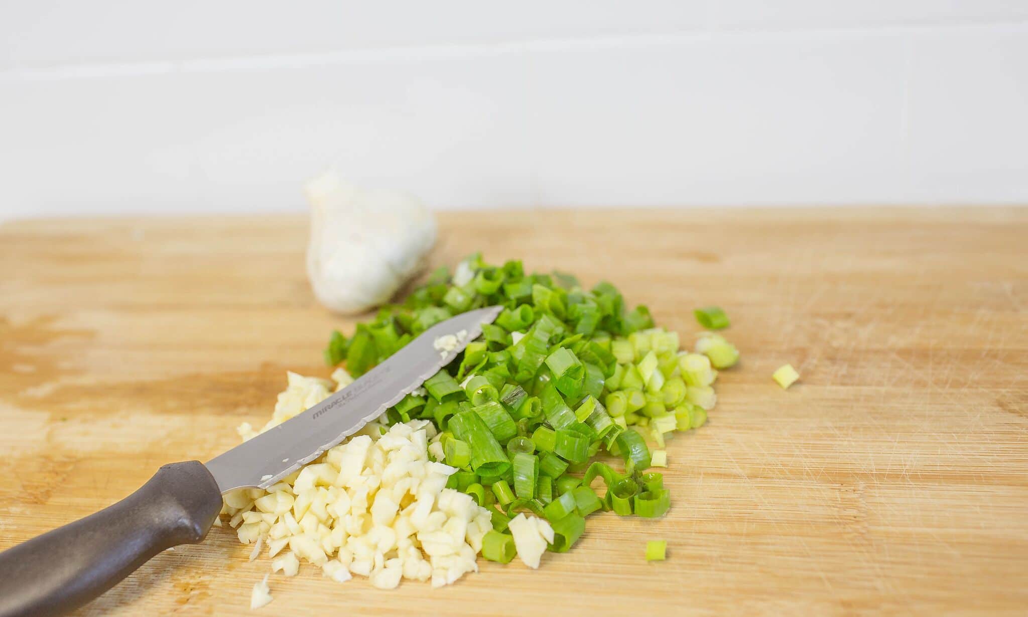 Chop green onions and garlic then set aside.