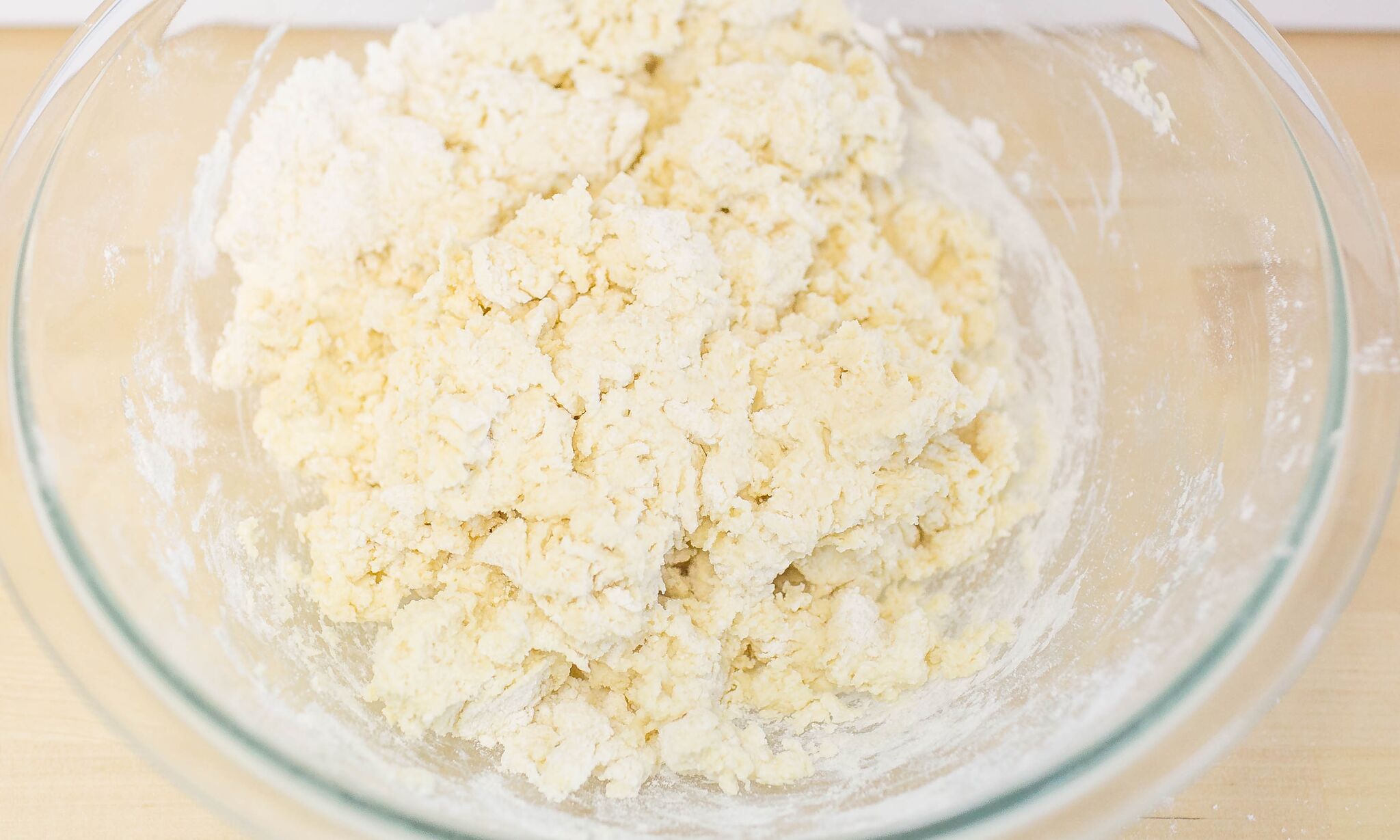 Add the buttermilk to the dry ingredients and mix together to form a dough. 