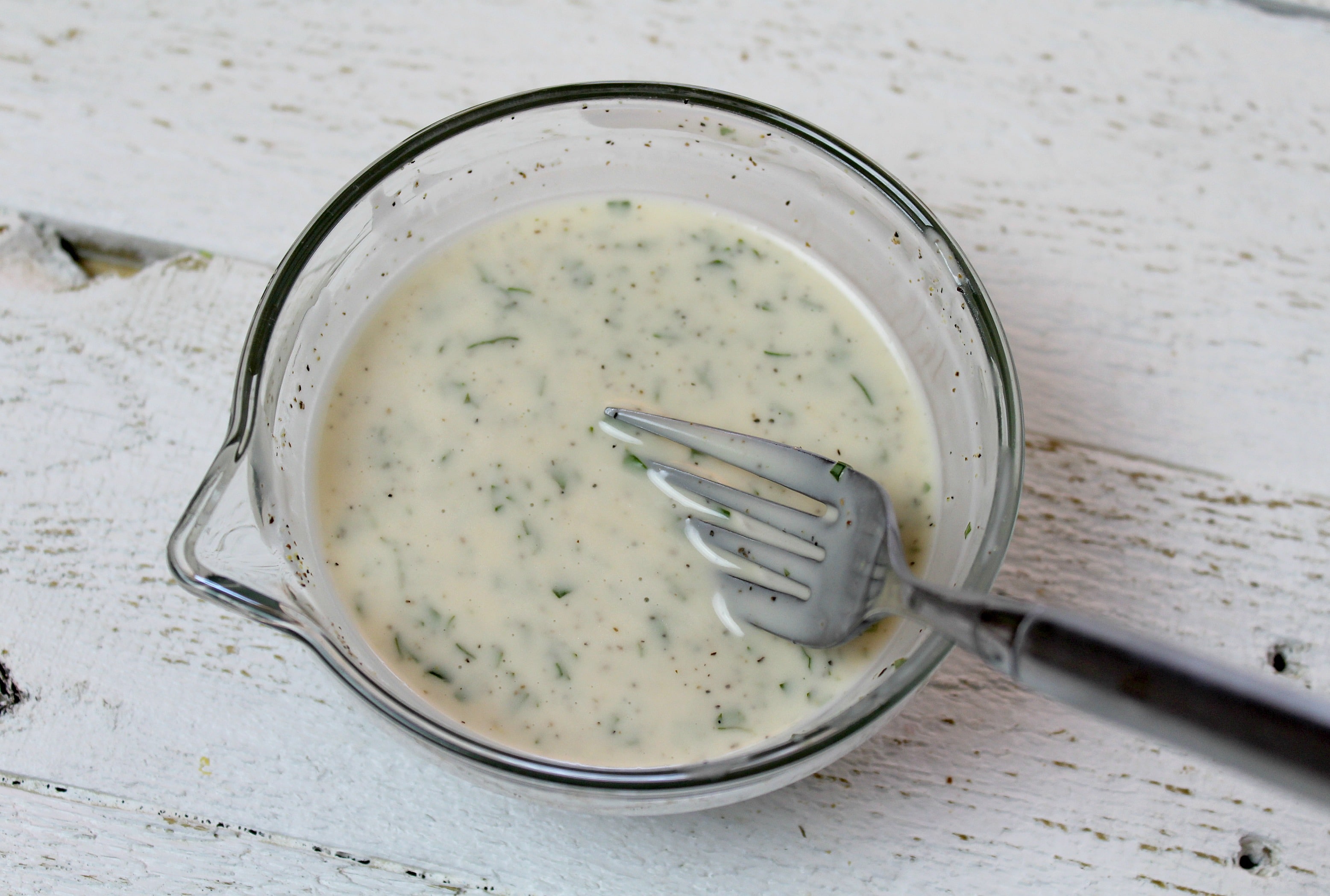 Whisk together basil, lemon juice, red wine vinegar, mayo, sea salt, and black pepper in a small bowl.