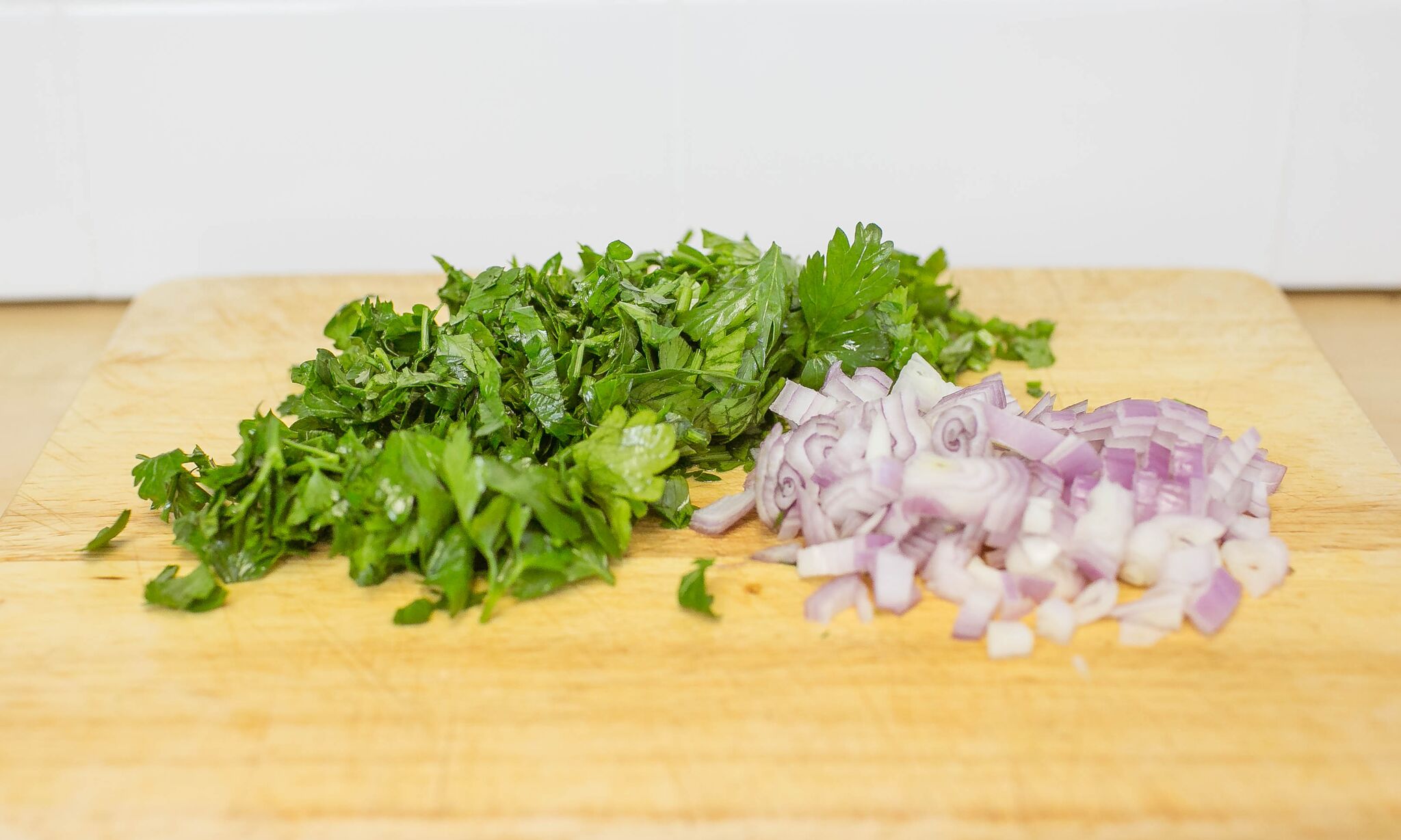 Chop half the parsley and shallot and set aside.