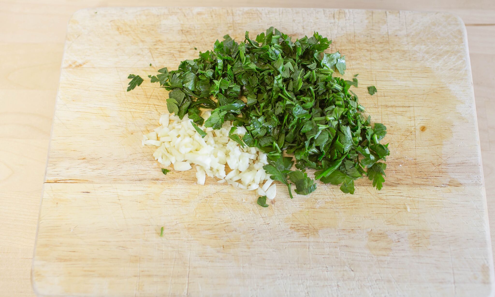 Chop garlic and parsley 
