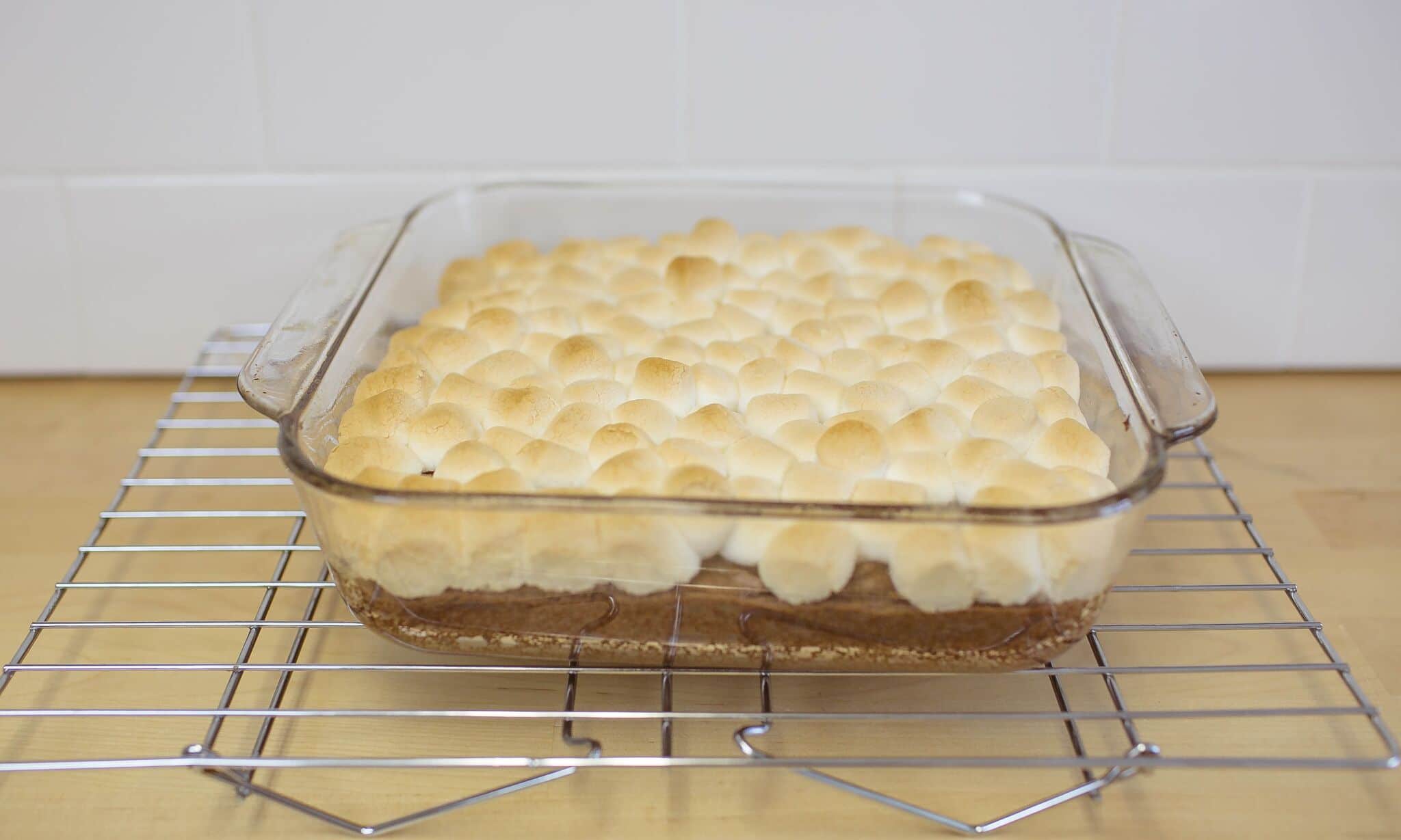 Bake brownies until marshmallows are golden. 