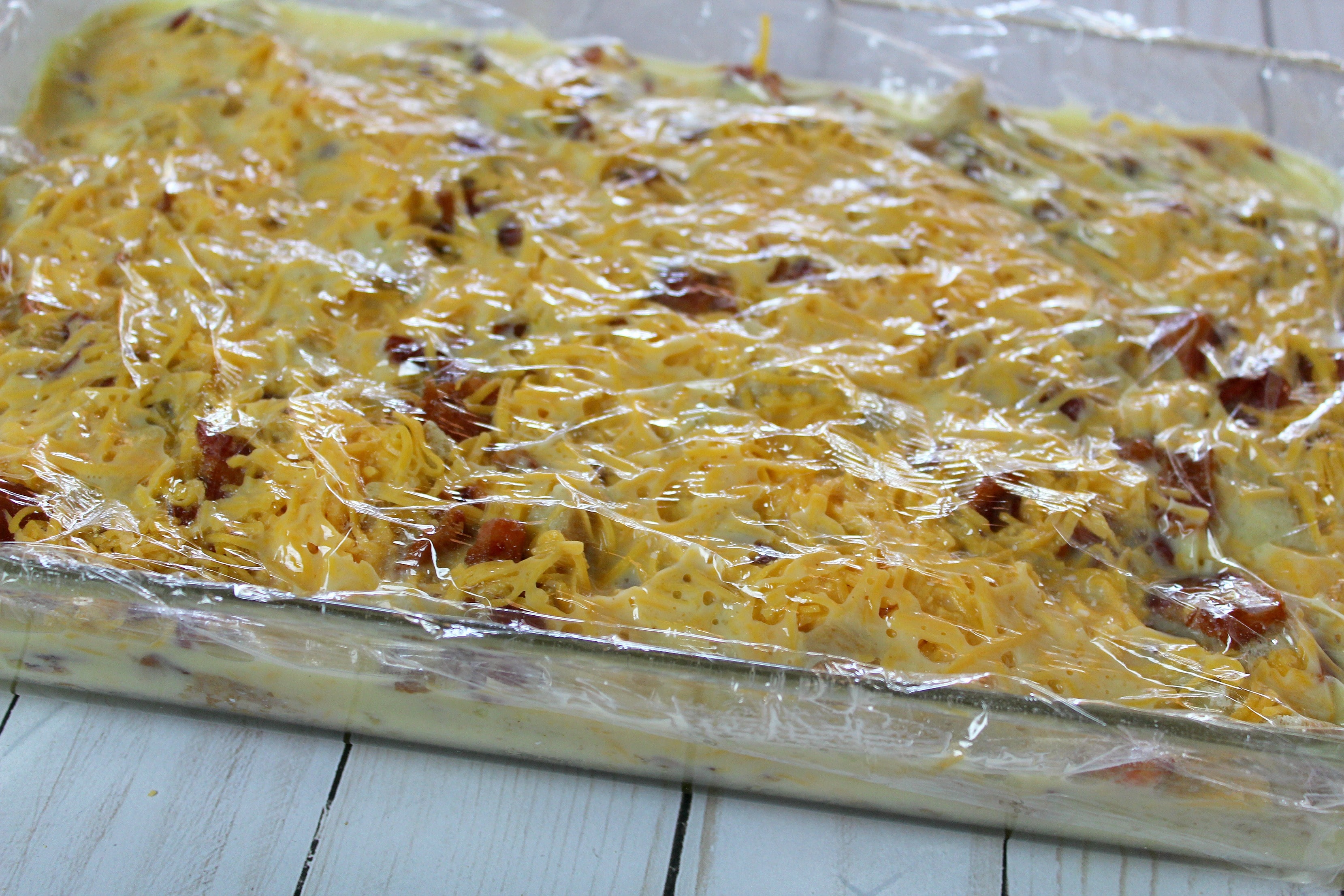 Cover casserole with plastic wrap and refrigerate overnight.