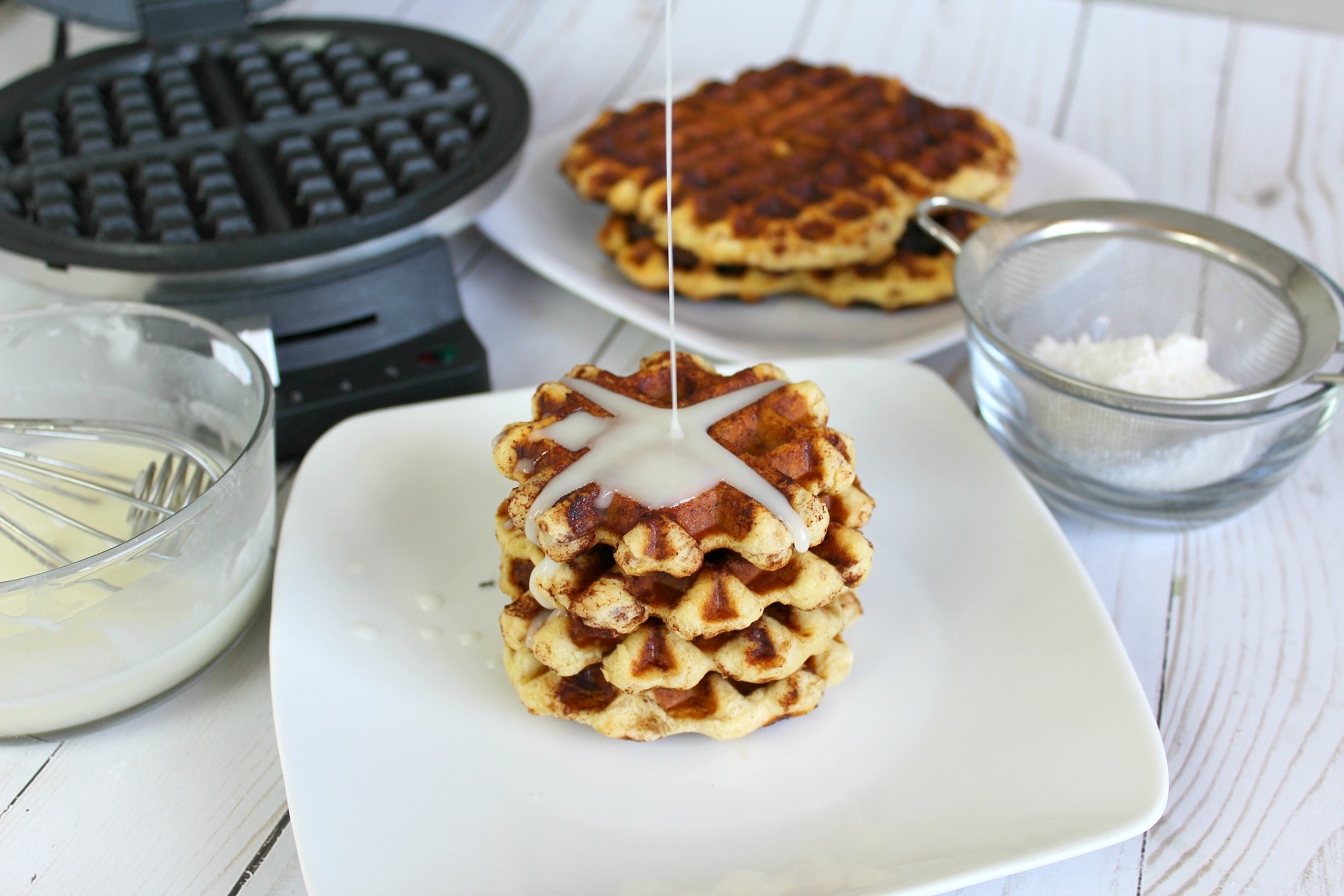 Serve these cinnamon waffles with glaze for a delicious weekend brunch