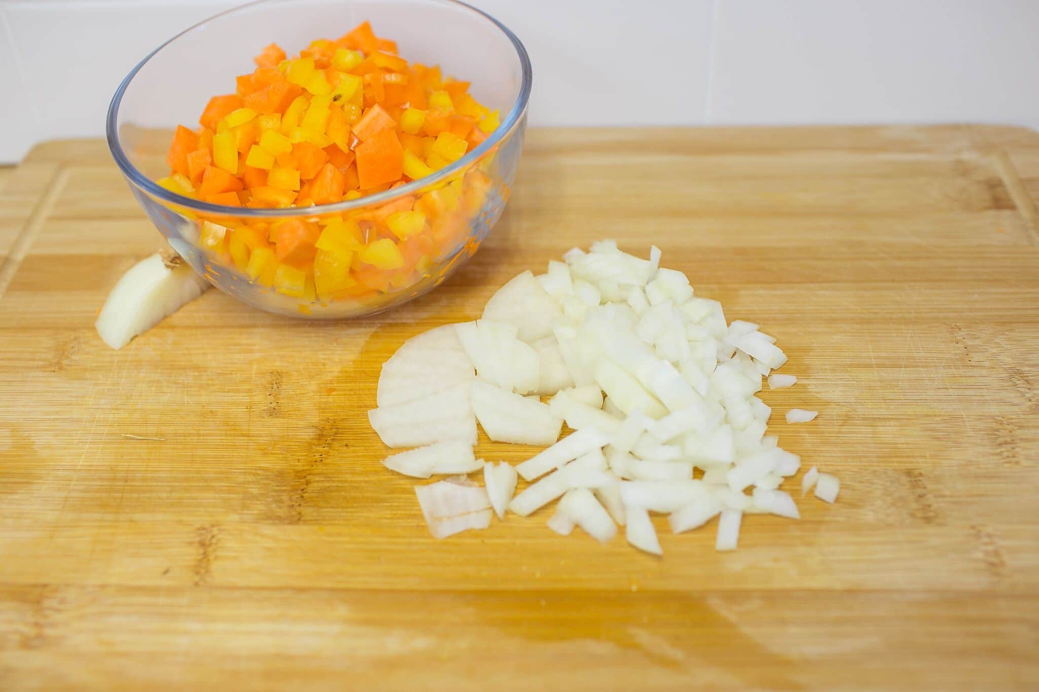 Dice onions and set aside with peppers and carrots