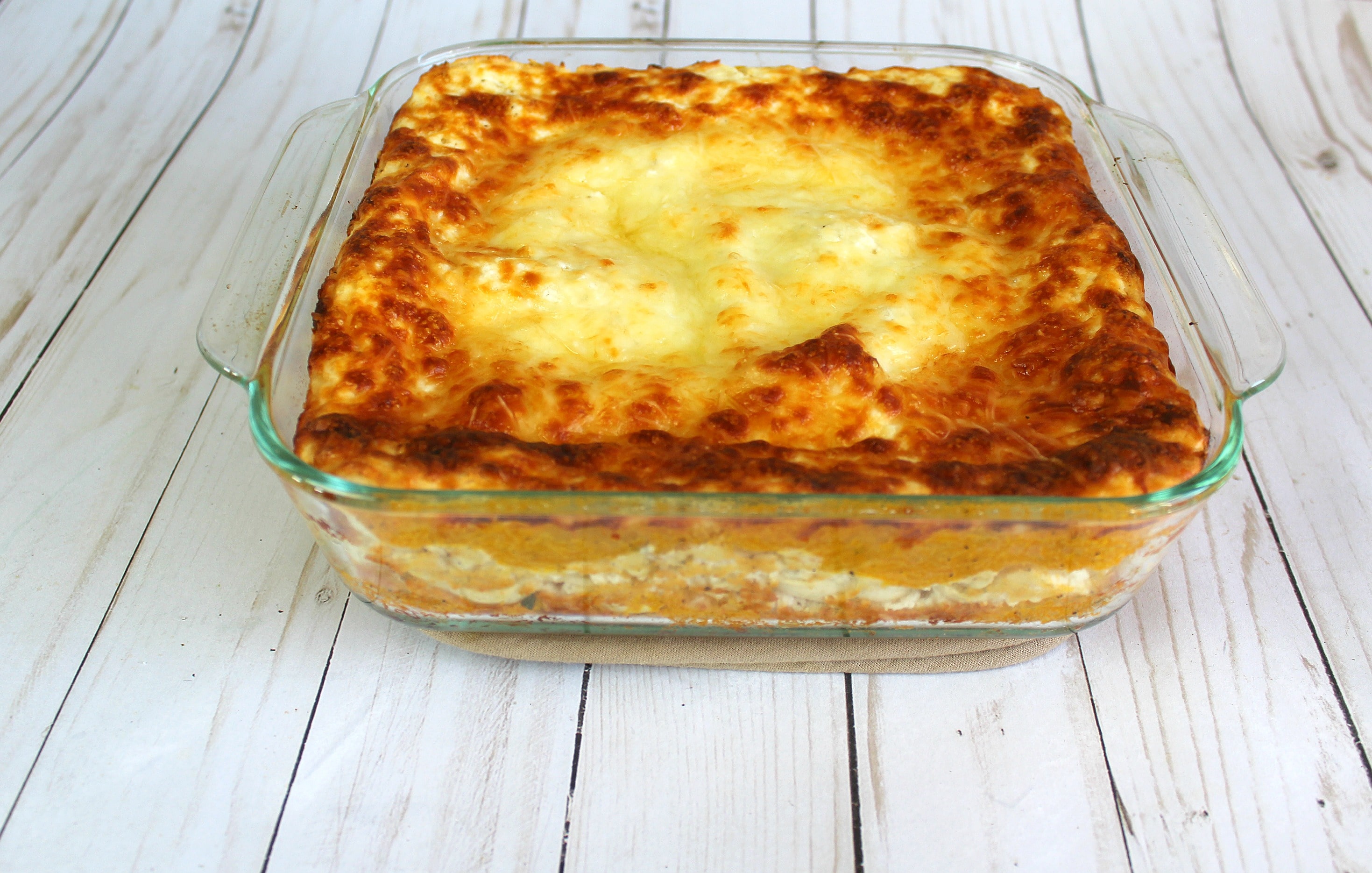 Bake lasagna for 30 minutes, then remove foil and cook for 25 more minutes uncovered. 