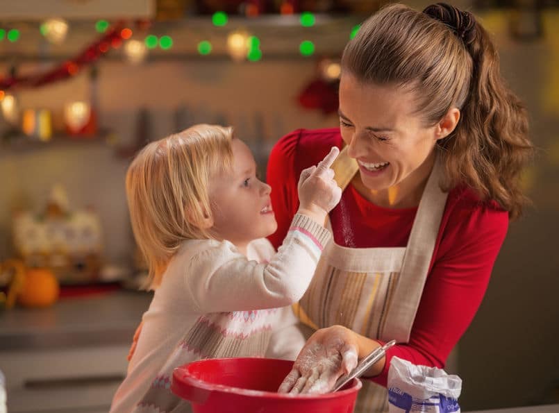 Cooking holiday cookies with your little one will get you in the Christmas spirit. 