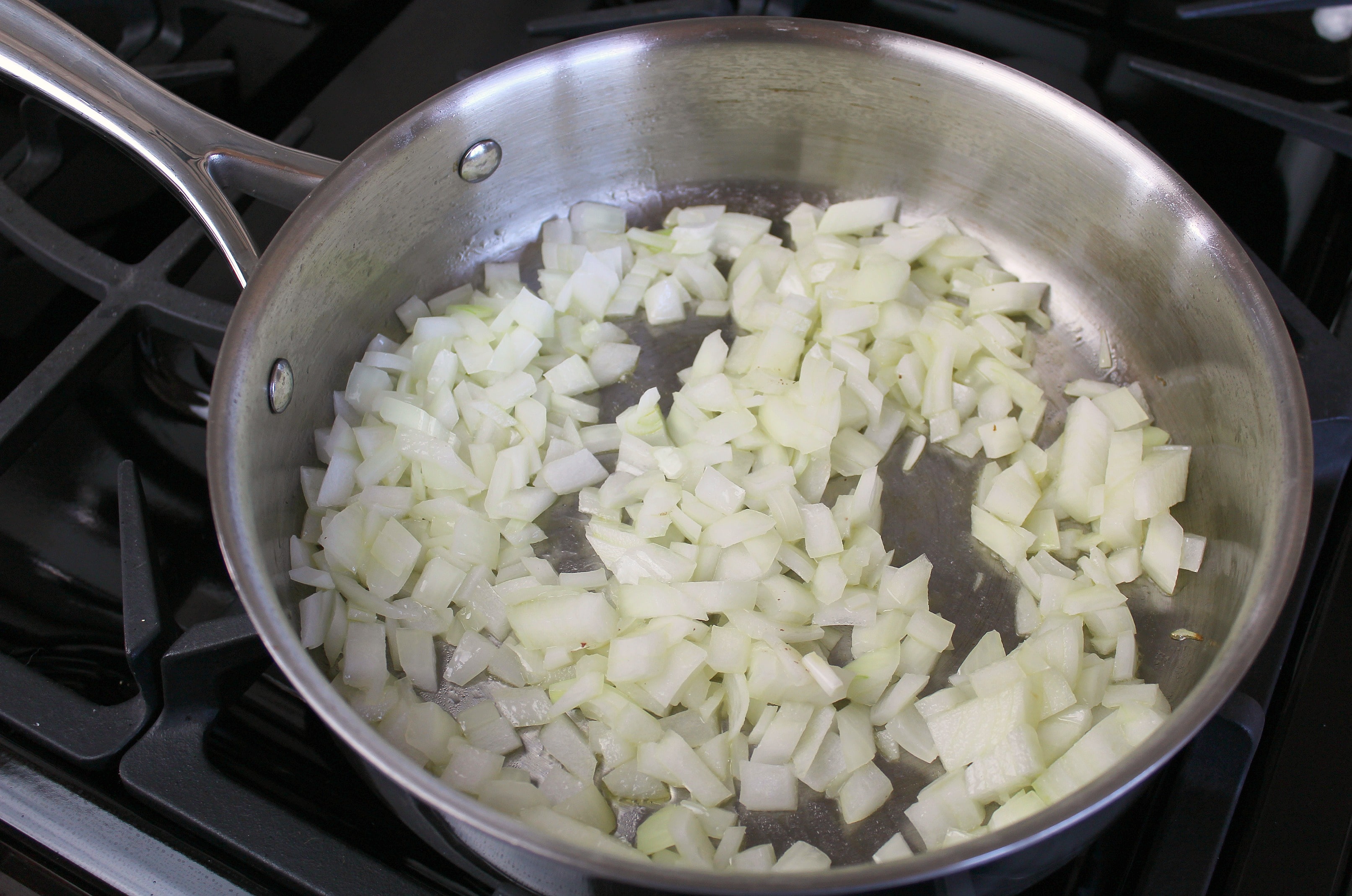 Saute a diced onion in a small pan until they become translucent. 