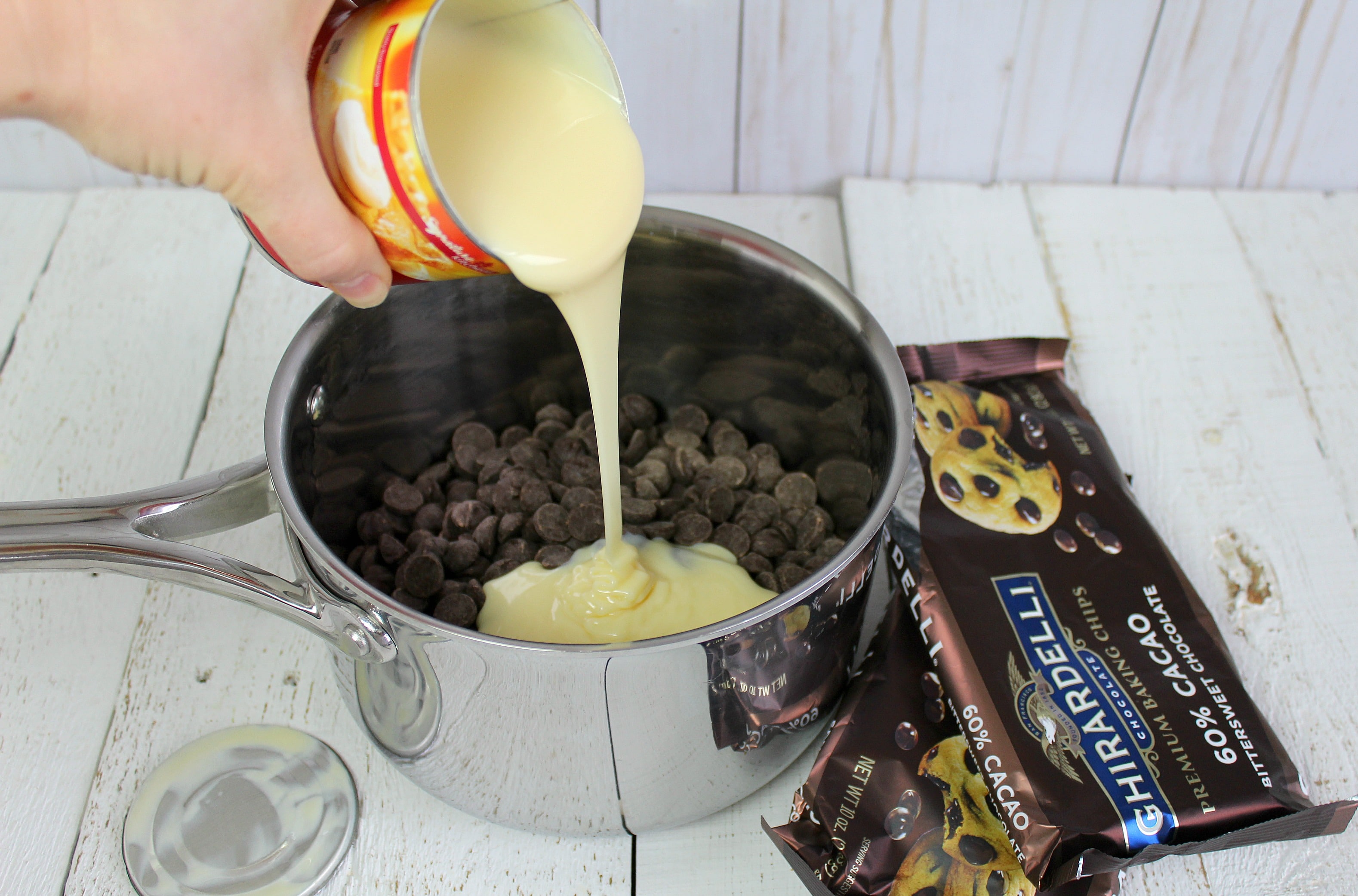 Step 2 of this Easy Peppermint Bark Fudge is to mix the condensed milk and chocolate.