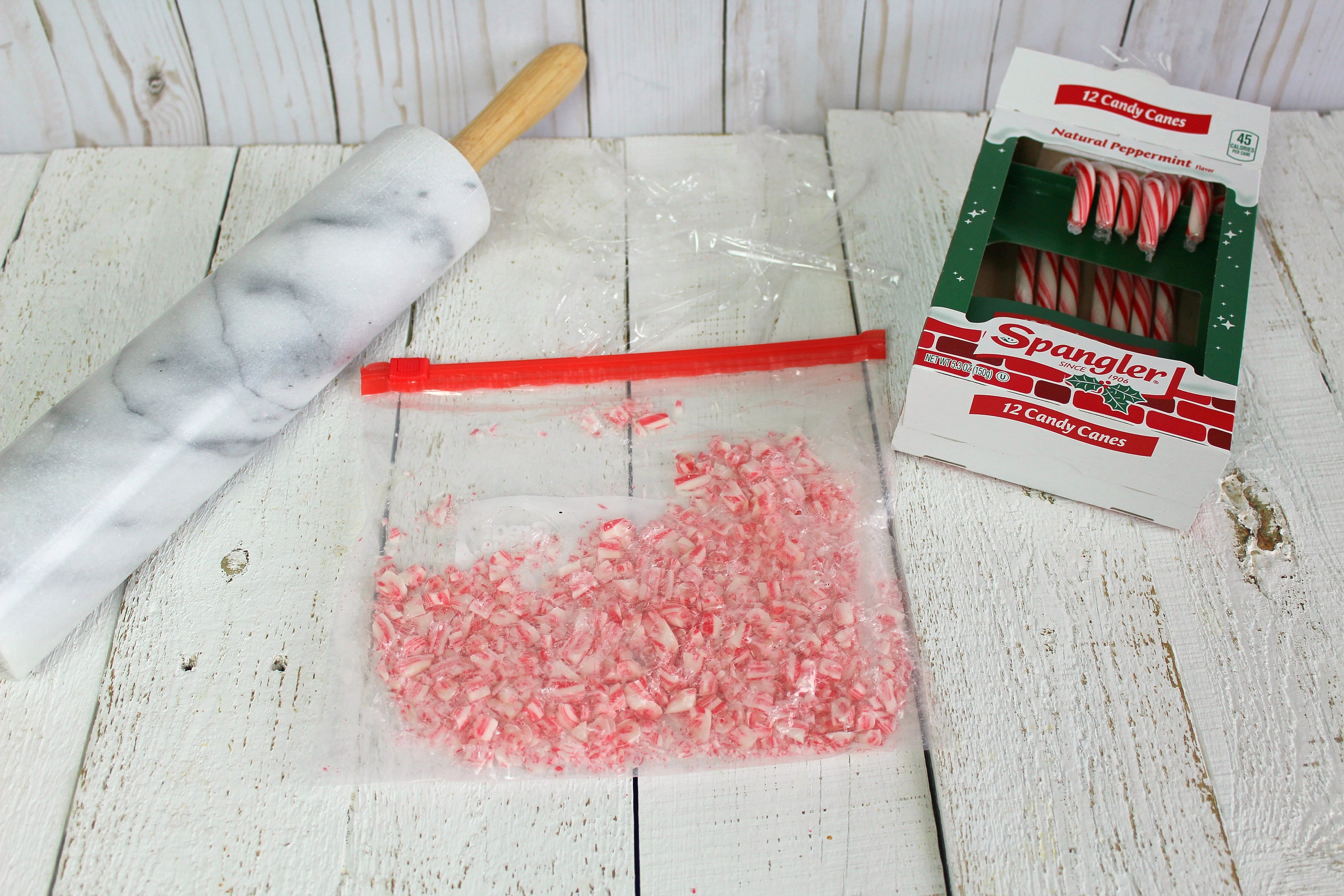 Next step of the Easy Peppermint Bark Fudge is to crush the candy canes.